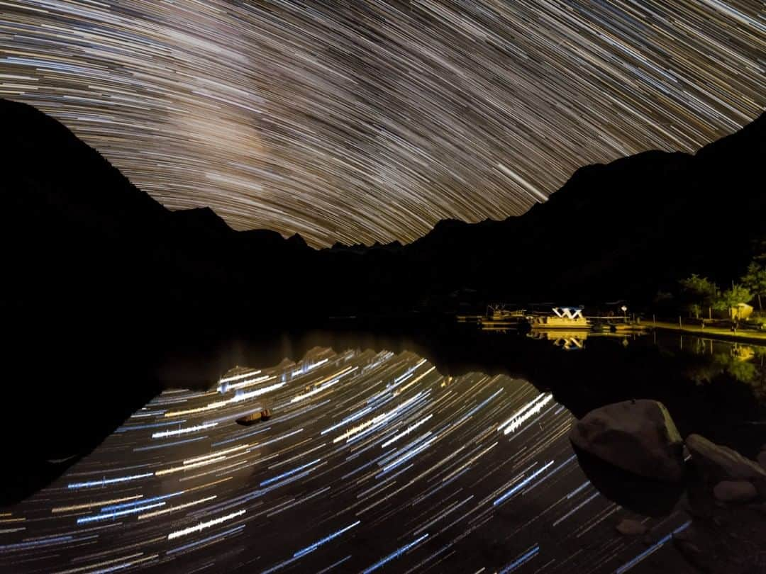 National Geographic Travelさんのインスタグラム写真 - (National Geographic TravelInstagram)「Photo by @BabakTafreshi | A summer night passes above a high Sierra lake, 9000 ft (3000m) high near Bishop, California. The Earth rotation, ever moving the sky above us, naturally paints this 40-minute long exposure (photo sequence) with colorful star trails. Explore more of The World at Night photography with me @babaktafreshi. ⁣#saveournightsky #astrophotography #nightphotography #longexosure」5月31日 4時06分 - natgeotravel