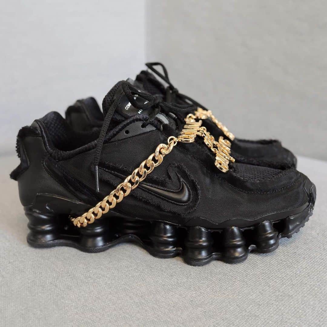 HYPEBEASTさんのインスタグラム写真 - (HYPEBEASTInstagram)「@hypebeastkicks: Take a closer look at the @commedesgarcons x @nike Shox TL in triple black. The reworked retro silhouette features a detachable jewelry piece that stands out in gold, as well as distressed Swoosh which gives the entire textile upper and tongue a cut-and-sew, frayed finish. This and the white pair are currently available at CDG locations across Japan and @doverstreetmarketginza. They’ll see a global release on June 13 for approximately $357 USD. Photo: Tora Northman / @hypebae」5月31日 11時45分 - hypebeast
