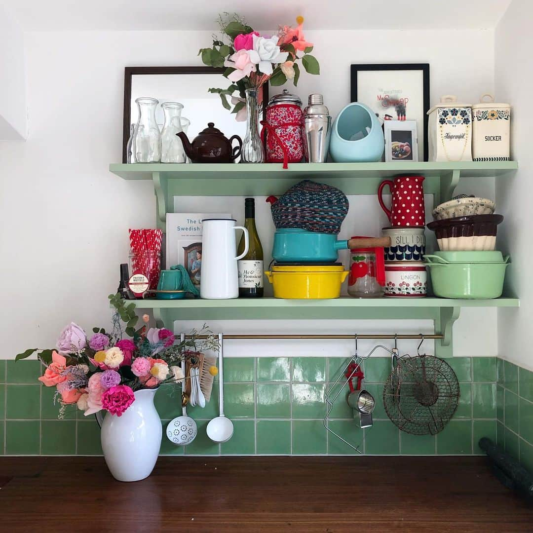 レイチェル・クーさんのインスタグラム写真 - (レイチェル・クーInstagram)「Happy Friday! This is my favourite corner of the @khoollect kitchen studio. I regularly change the bric-a-brac I’ve collected from my travels on the shelves. ✈️⛵️🌍One of my favs has to be my mum’s knitted tea cosy.  What’s your favourite kitchen knick knack? 🥣🍶🍴 A lot of stuff on the shelf is vintage but have tagged as much as I could. . . . . . Yellow pot @maisonempereur  Enamelware jug @falconenamel {gifted} Brown betty teapot @labourandwaitlondon  Coffee pot cosy @libertylondon  Marble rolling pin @clasohlsonuk {gifted} Turquoise pot by Dansk kobenstyle cookware Ladles by Riess enamelware Glass bottles @leparfaitworldwide  Brush @irishantverk  Paper flowers @pompomfactory {gifted} Illustration @thomas.baas  Reclaimed iroko work surface @retrouvius  Tiles @milagros_london {discounted} Kitchen shelves and brass hanging rod @devolkitchens {discounted} . . . . . . . #rachelkhoo #rachelkhookitchen #khoollect #vintage #kitchendesign #kitchen」5月31日 14時44分 - rachelkhooks