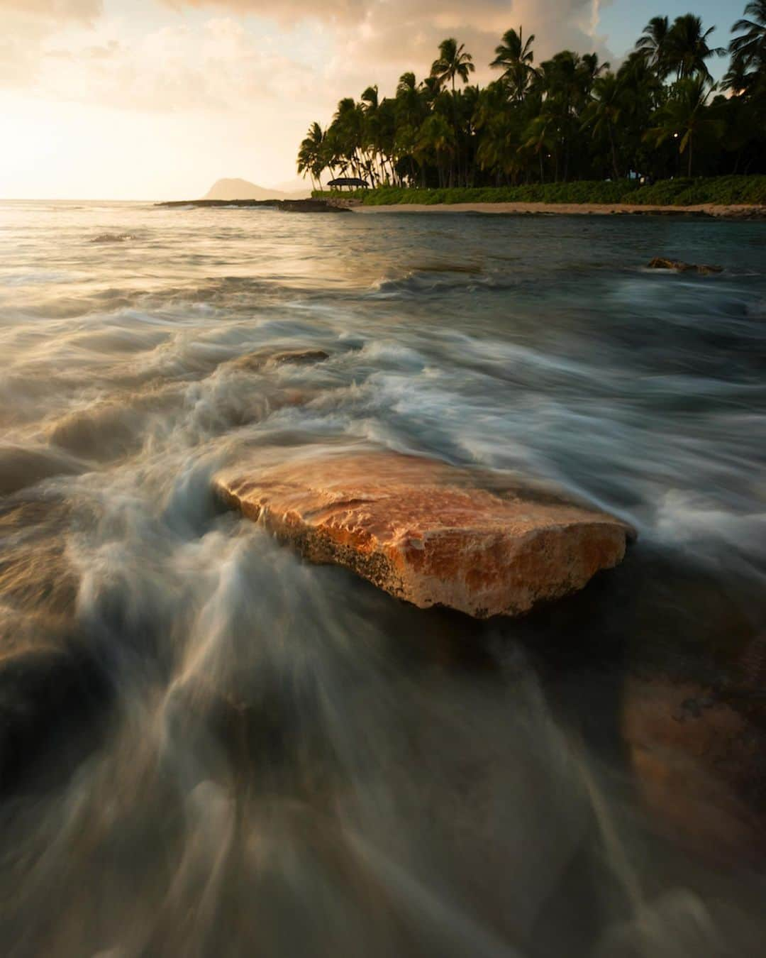 NikonUSAさんのインスタグラム写真 - (NikonUSAInstagram)「For #Nikon100 photographer @alohaninalove, a typical day-in-the-life begins with chasing the sunrise on the beach and capturing the serene movements of ocean waves throughout the day. Drawing inspiration from living in Hawaii, Nina shares what her days off look like through breathtaking photos of the beach. “Sunset is my favorite time of the day. In these photos, I wanted to focus on the rock and the movement of the water surrounding it. The contrast of lighting is also an important element.” Swipe through to see her breathtaking work, shot with the #Nikon #D810 and #NIKKOR 14-24mm f/2.8 lens. 📸 by @alohaninalove. #outdoorphotography #Hawaii #beach #ocean #chasingwaves #sunsets #NikonLove」6月1日 1時17分 - nikonusa