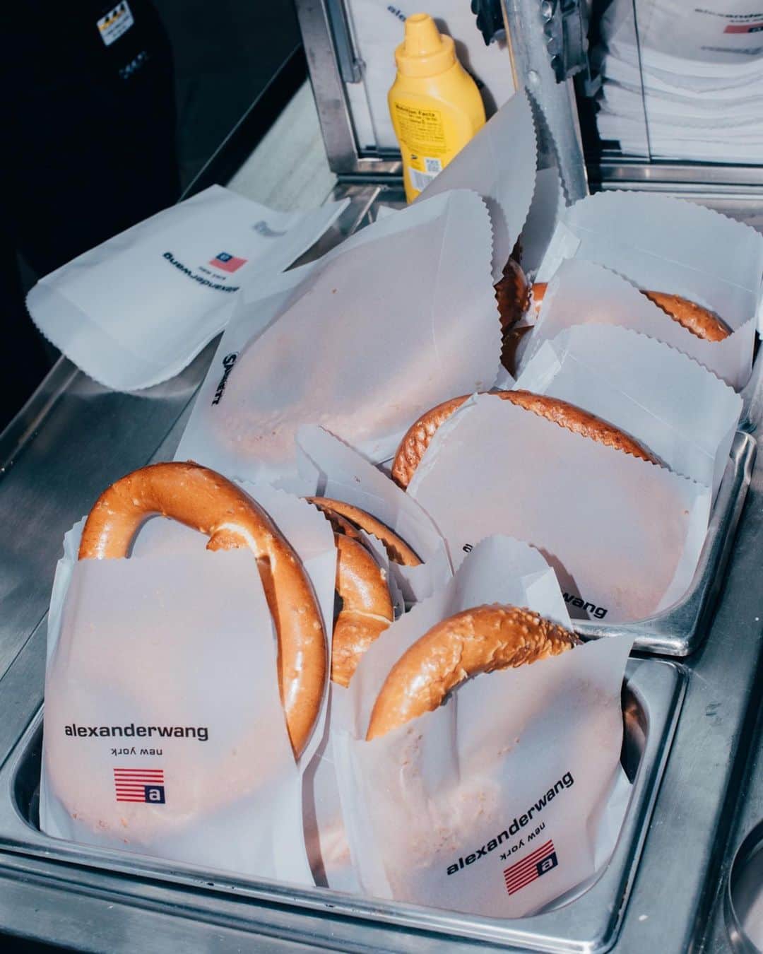 アレキサンダー・ワンのインスタグラム：「At your service. Soft pretzel, @Sabrett and @nuts4nutsofficial carts lined the streets for our #Collection12020 runway show at Rockefeller Center. ⠀⠀⠀⠀⠀⠀⠀⠀⠀ Photos by @timothysean.」