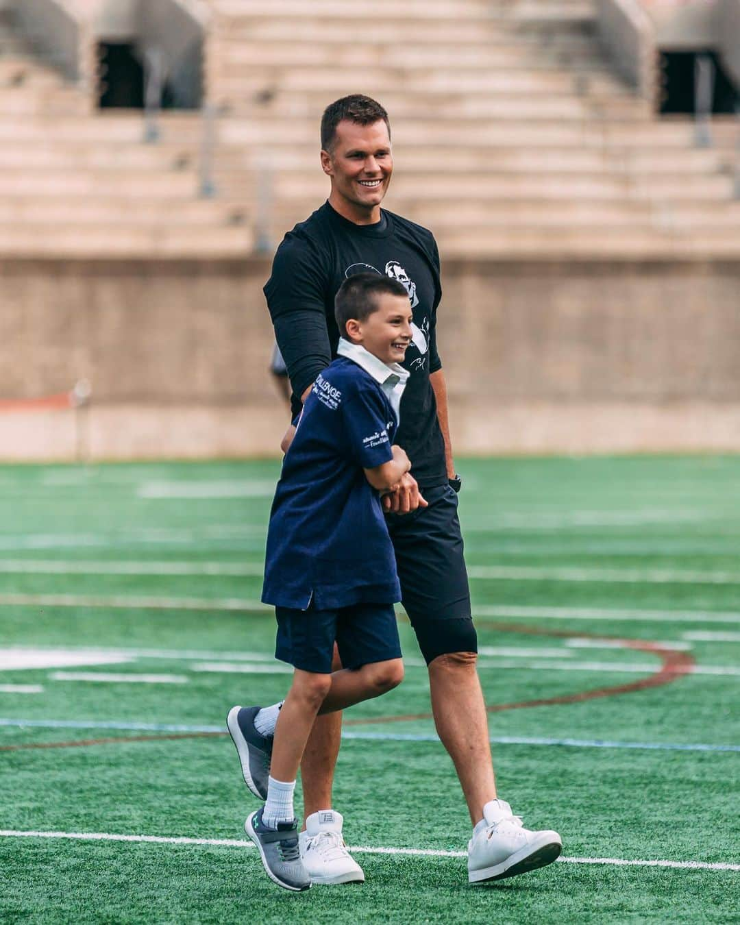 トム・ブレイディさんのインスタグラム写真 - (トム・ブレイディInstagram)「Last night, I was fortunate to take part in the 20th Annual @bestbuddies Football Challenge at Harvard Stadium! This weekend over 7 million dollars will be raised to support Best Buddies, a non-profit organization dedicated to creating opportunities for friendship, employment, leadership development and inclusive living for people with intellectual and developmental disabilities.  My friend Anthony Shriver started Best Buddies in his college dorm room 30 years ago and has since grown from one chapter to nearly 2,900 middle school, high school, and college chapters worldwide.  My first time taking part in the Best Buddies Hyannisport challenge was in 2002 and yesterday it was so special to have both my sons Jack and Benny playing with me in the football game! I’m beyond blessed in my life and feel a great responsibility to give back to those in our community who face unique challenges. No matter who the person is or how different he or she may appear, each person has a unique talent. It’s up to all of us to discover that talent and celebrate it. I want my kids to grow up in a world where people are recognized and celebrated for the characteristics that make them uniquely themselves because we’re all better when we include everyone.」6月1日 22時57分 - tombrady