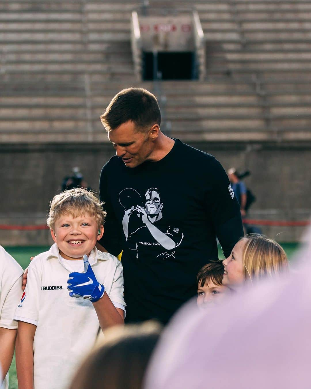 トム・ブレイディさんのインスタグラム写真 - (トム・ブレイディInstagram)「Last night, I was fortunate to take part in the 20th Annual @bestbuddies Football Challenge at Harvard Stadium! This weekend over 7 million dollars will be raised to support Best Buddies, a non-profit organization dedicated to creating opportunities for friendship, employment, leadership development and inclusive living for people with intellectual and developmental disabilities.  My friend Anthony Shriver started Best Buddies in his college dorm room 30 years ago and has since grown from one chapter to nearly 2,900 middle school, high school, and college chapters worldwide.  My first time taking part in the Best Buddies Hyannisport challenge was in 2002 and yesterday it was so special to have both my sons Jack and Benny playing with me in the football game! I’m beyond blessed in my life and feel a great responsibility to give back to those in our community who face unique challenges. No matter who the person is or how different he or she may appear, each person has a unique talent. It’s up to all of us to discover that talent and celebrate it. I want my kids to grow up in a world where people are recognized and celebrated for the characteristics that make them uniquely themselves because we’re all better when we include everyone.」6月1日 22時57分 - tombrady