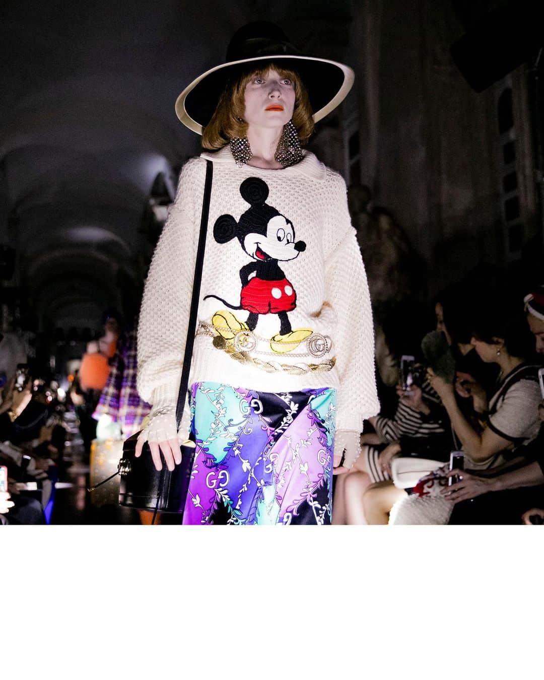 のインスタグラム：「A knit features Mickey Mouse with a flared velvet GG print skirt by @alessandro_michele, on the runway for the #GucciCruise20 fashion show at Rome’s Capitoline Museums @museiincomuneroma. #AlessandroMichele #MuseiCapitolini Disney x Gucci ©Disney  See a video of the collection through link in bio.」