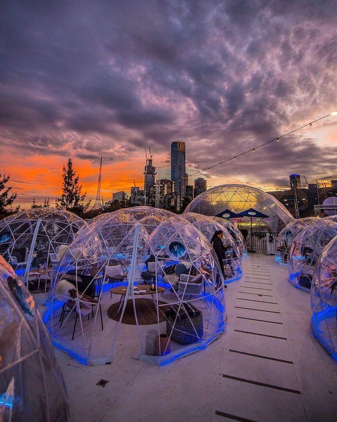 Australiaさんのインスタグラム写真 - (AustraliaInstagram)「There's no doubt about it, @visitmelbourne does #winter very well ❄️ @rayofmelbourne snapped this amazing shot at @thewintervillage, which certainly looks like the "coolest" place to be this season - pardon the pun, it was too good to resist! 😉This pop-up euro-style winter wonderland is open from now through to the end of August. It sits atop the Skyline Terrace at #FederationSquare and comes complete with a mega igloo dining and drinking hall (where it snows inside on the hour!), an ice skating rink and a village of 21 cosy igloos which can be privately booked for a feasting extravaganza with friends. Oh, and did we mention there are beautiful city views and espresso martinis on tap, too?  #seeaustralia #visitmelbourne #TheWinterVillage #city #travel」6月3日 4時00分 - australia