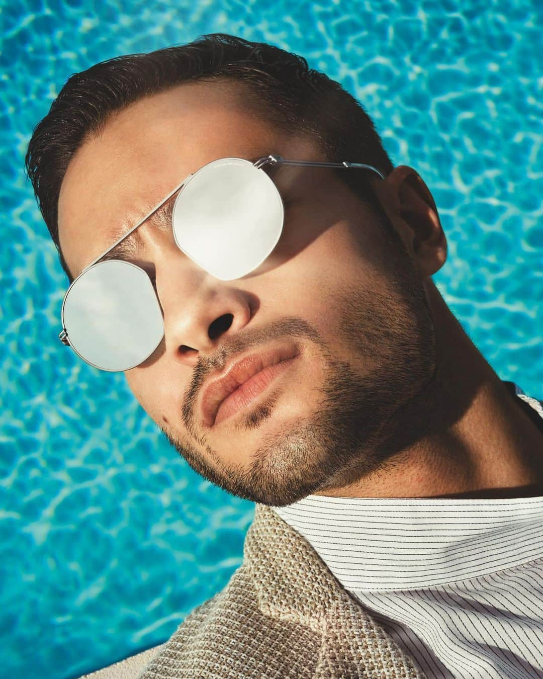 Armani Officialさんのインスタグラム写真 - (Armani OfficialInstagram)「Mirror lenses and an eye-catching design for an unforgettable summer look #EAsunglasses」6月4日 0時22分 - emporioarmani