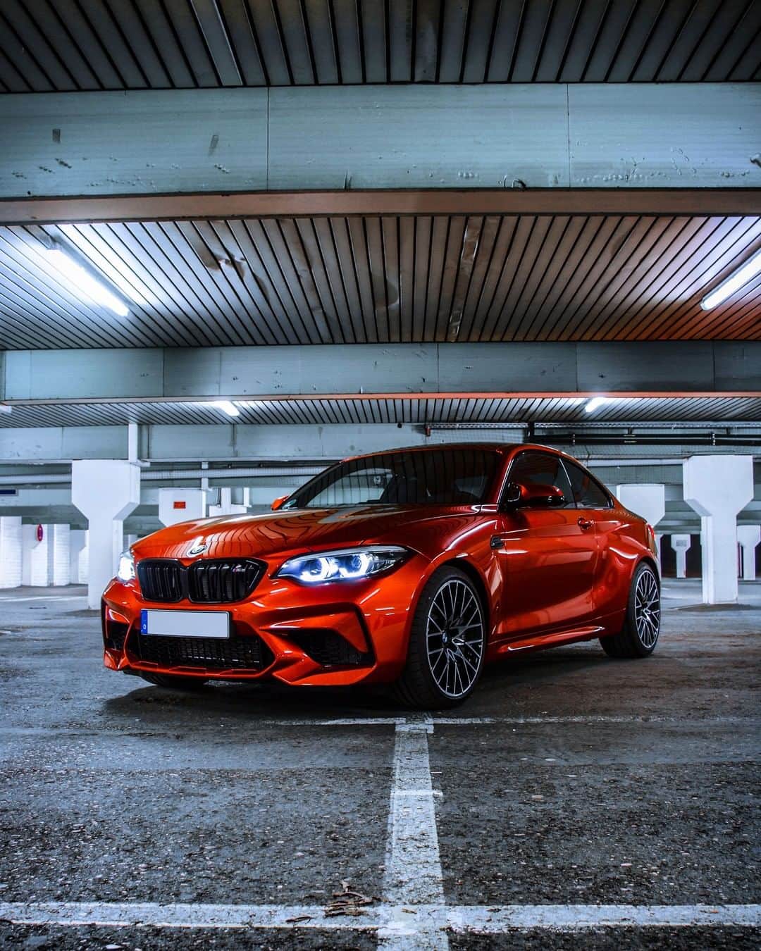 BMWのインスタグラム：「Mind-blowing intensity in color as well. The BMW M2 Competition. #BMWrepost @bmwm2_competition @supercars.t  #BMW #M2 #BMWM  __ BMW M2 Competition: Fuel consumption in l/100 km (combined): 10.0 - 9.8 (9.2 - 9.0). CO2 emissions in g/km (combined): 227 - 224 (209 - 206). The figures in brackets refer to the vehicle with seven-speed M double-clutch transmission with Drivelogic. The values of fuel consumptions, CO2 emissions and energy consumptions shown were determined according to the European Regulation (EC) 715/2007 in the version applicable at the time of type approval. The figures refer to a vehicle with basic configuration in Germany and the range shown considers optional equipment and the different size of wheels and tires available on the selected model. The values of the vehicles are already based on the new WLTP regulation and are translated back into NEDC-equivalent values in order to ensure the comparison between the vehicles. [With respect to these vehicles, for vehicle related taxes or other duties based (at least inter alia) on CO2-emissions the CO2 values may differ to the values stated here.] The CO2 efficiency specifications are determined according to Directive 1999/94/EC and the European Regulation in its current version applicable. The values shown are based on the fuel consumption, CO2 values and energy consumptions according to the NEDC cycle for the classification. For further information about the official fuel consumption and the specific CO2 emission of new passenger cars can be taken out of the „handbook of fuel consumption, the CO2 emission and power consumption of new passenger cars“, which is available at all selling points and at https://www.dat.de/angebote/verlagsprodukte/leitfaden-kraftstoffverbrauch.html.」