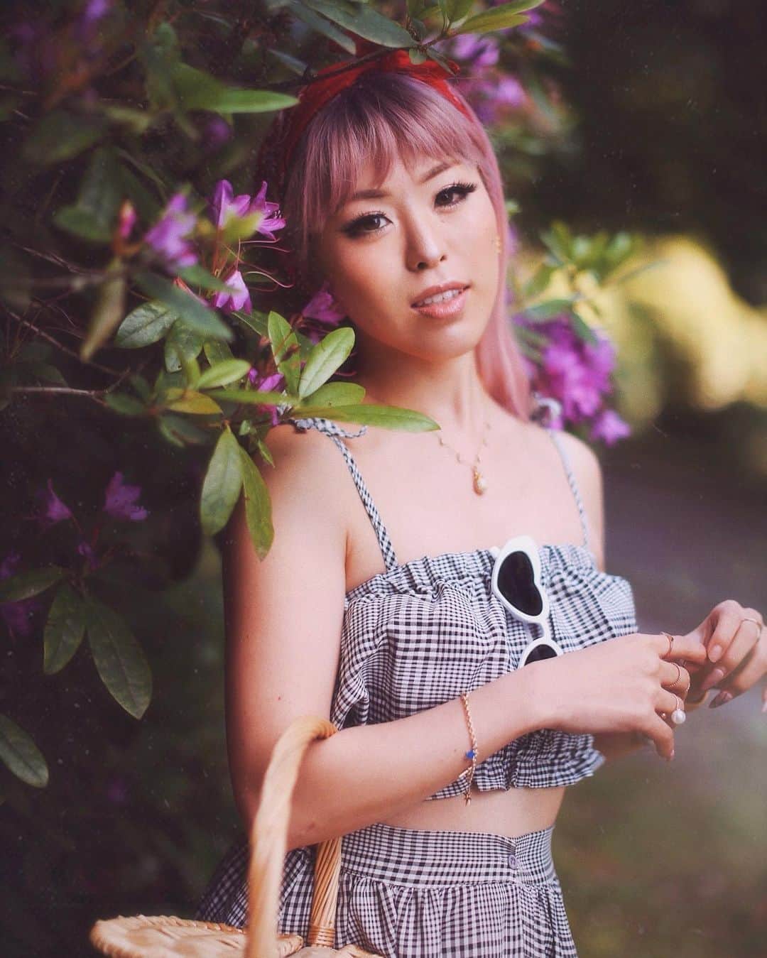 AikA♡ • 愛香 | JP Blogger • ブロガーのインスタグラム：「The arrival of June has me daydreaming about long summer days, my basket full of fresh food, the scent of flowers in the air and ending the evening with a lover's kiss 💕✨ It makes you feel like bounty is just around the corner! 🌺🌻 Also love how these flowers match my hair 😍 What are you daydreaming about? ..... ▸ 📷: @jason_nak_photo  #happyjune #pinkhair #aikaslovecloset #summertime #portrait_star #mypersonalstyle #uoonyou」