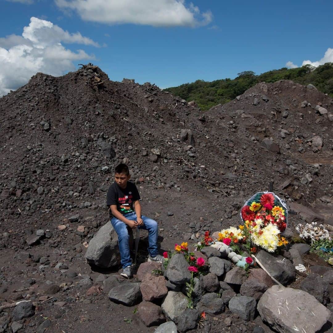 TIME Magazineさんのインスタグラム写真 - (TIME MagazineInstagram)「A relative of Silveria Hernandez, a victim of last year’s violent eruption of the Volcán de Fuego (Volcano of Fire), sits close to the site where she died in San Miguel Los Lotes, near the Guatemalan city of Escuintla, on June 3. In commemoration of the first anniversary of the eruption, which killed some 200 people and left many more missing, a march was held where the village once stood. Photograph by Moises Castillo (@mfca1975)—@apnews」6月5日 1時33分 - time