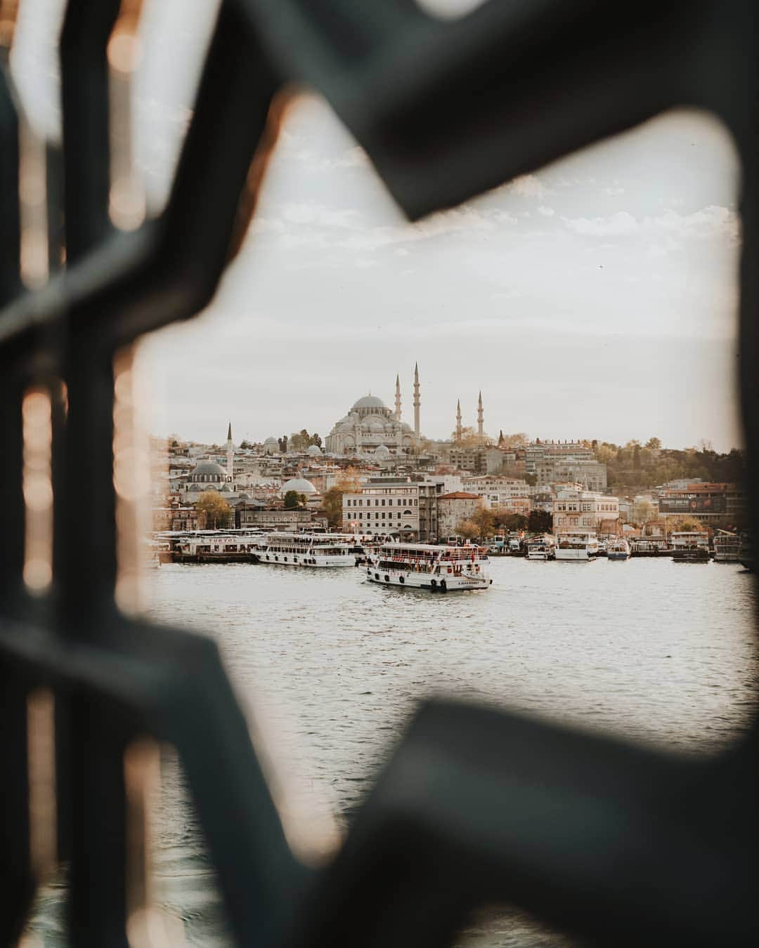 のインスタグラム：「Through Galata Bridge // it was just last month when I visited Istanbul but the memory stay still in my mind. Including this scene on my last day in Istanbul. Despite of the taxi scam, and the smell of kebab, Istanbul is totally on my top 3 favorite city to explore after Paris and Siena. What about you? What is your top 3 favorite city to explore? . . . Taken with @sonyalpha @sonyalpha_id @sonyindonesia #a7iii 35mm 1.4」