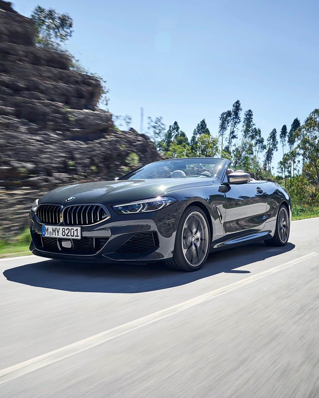 BMWのインスタグラム：「Brings high standards and grace to the roads. THE 8. #THE8 #BMW #8Series #Convertible __ BMW M850i xDrive Convertible: Fuel consumption in l/100 km (combined): 10.0 - 9.9. CO2 emissions in g/km (combined): 229 - 225*; *All performance, fuel consumption and emissions figures are provisional. The values of fuel consumptions, CO2 emissions and energy consumptions shown were determined according to the European Regulation (EC) 715/2007 in the version applicable at the time of type approval. The figures refer to a vehicle with basic configuration in Germany and the range shown considers optional equipment and the different size of wheels and tires available on the selected model. The values of the vehicles are already based on the new WLTP regulation and are translated back into NEDC-equivalent values in order to ensure the comparison between the vehicles. [With respect to these vehicles, for vehicle related taxes or other duties based (at least inter alia) on CO2-emissions the CO2 values may differ to the values stated here.] The CO2 efficiency specifications are determined according to Directive 1999/94/EC and the European Regulation in its current version applicable. The values shown are based on the fuel consumption, CO2 values and energy consumptions according to the NEDC cycle for the classification. For further information about the official fuel consumption and the specific CO2 emission of new passenger cars can be taken out of the „handbook of fuel consumption, the CO2 emission and power consumption of new passenger cars“, which is available at all selling points and at https://www.dat.de/angebote/verlagsprodukte/leitfaden-kraftstoffverbrauch.html.」