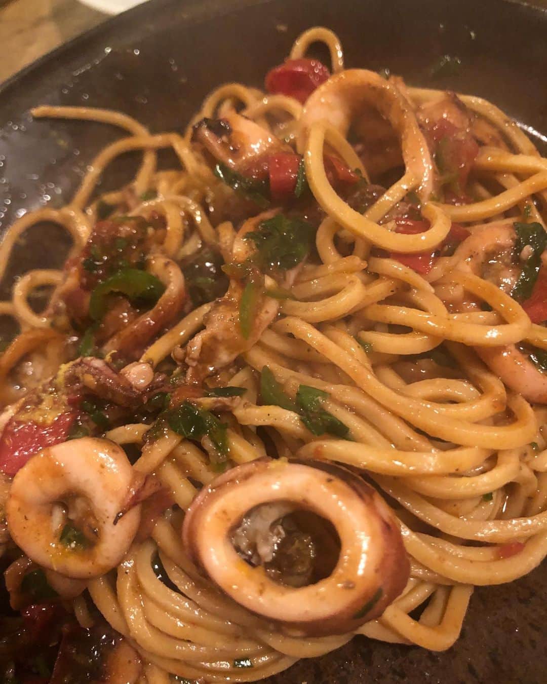 大根仁のインスタグラム：「例のパスタ屋。初めて夜に行ってみた。ムギイカと青唐辛子のパスタ。天才の仕事。」