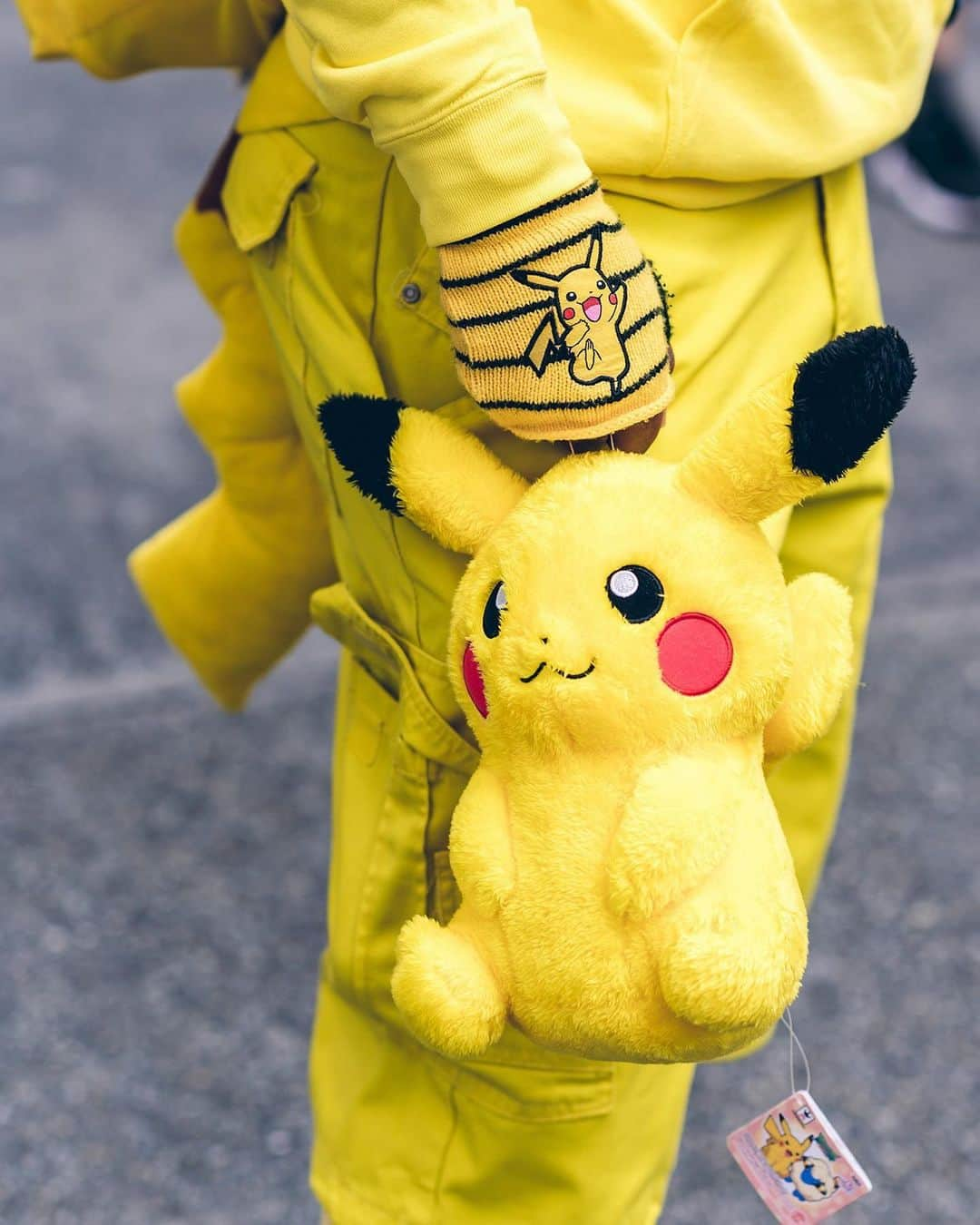 Harajuku Japanさんのインスタグラム写真 - (Harajuku JapanInstagram)「J. on the street in Harajuku wearing a Pikachu inspired street style featuring a Pikachu umbrella, Pikachu face mask, plushies, backpack, tights, and tail along with matching yellow and black Asics sneakers.」6月6日 16時05分 - tokyofashion