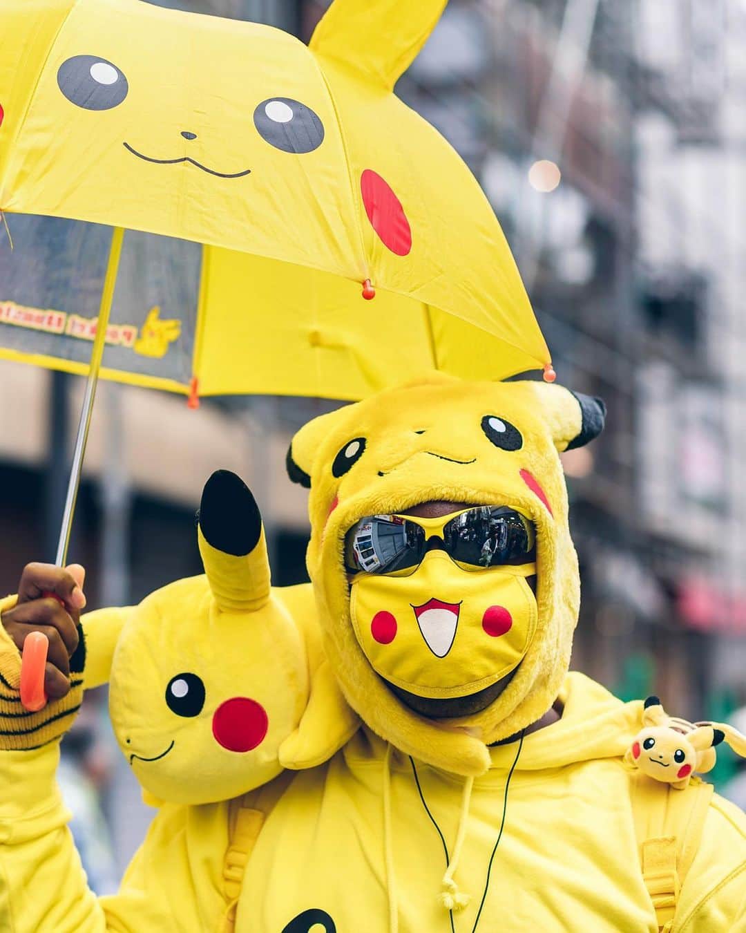 Harajuku Japanさんのインスタグラム写真 - (Harajuku JapanInstagram)「J. on the street in Harajuku wearing a Pikachu inspired street style featuring a Pikachu umbrella, Pikachu face mask, plushies, backpack, tights, and tail along with matching yellow and black Asics sneakers.」6月6日 16時05分 - tokyofashion