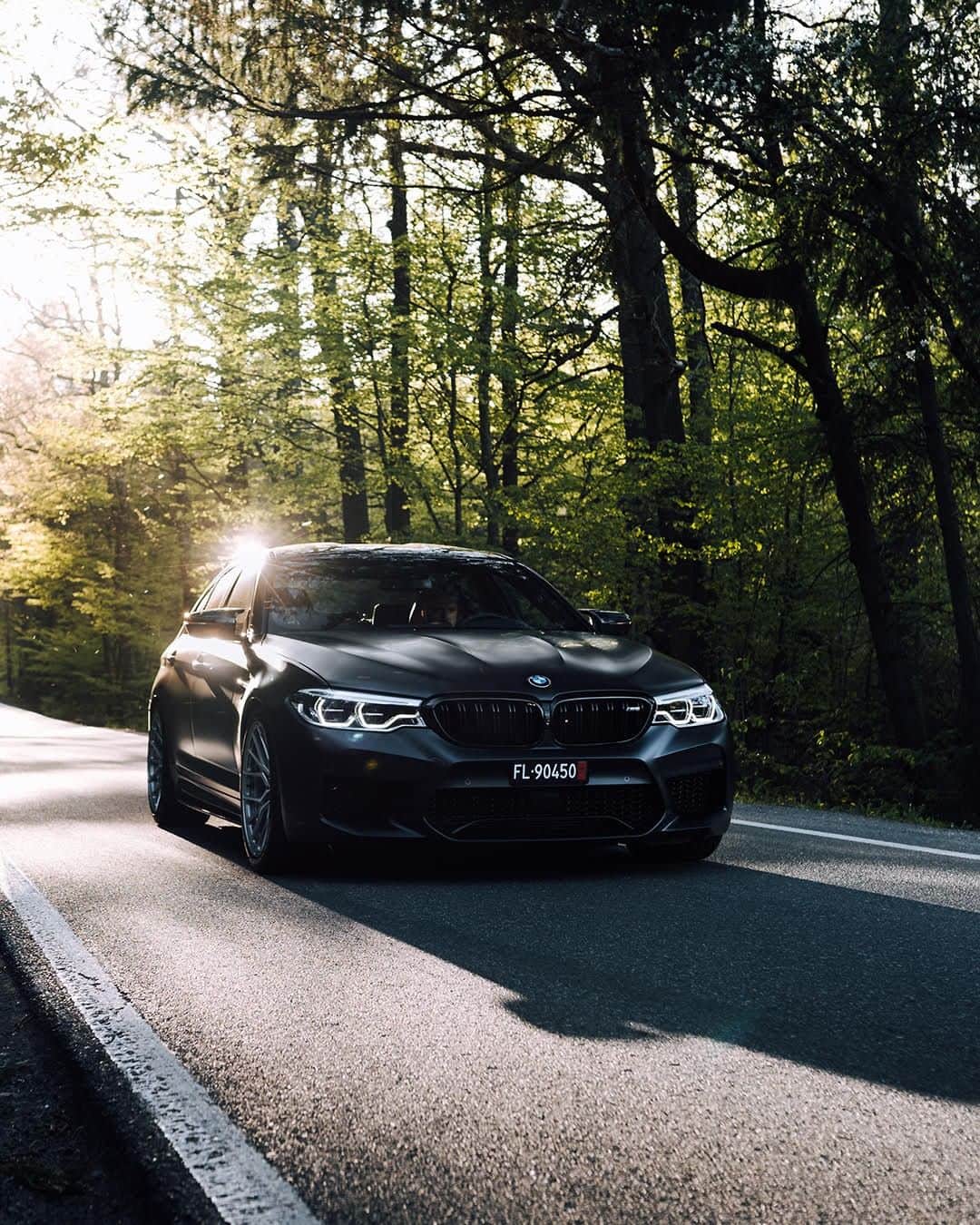 BMWのインスタグラム：「Breath-taking, eye-catching sight. The BMW M5 Sedan. #BMWrepost @georgiancollector @minarikd  #BMW #M5 #BMWM __ BMW M5 Sedan: Fuel consumption in l/100 km (combined): 10.8 - 10.7. CO2 emissions in g/km (combined): 246 - 243. The values of fuel consumptions, CO2 emissions and energy consumptions shown were determined according to the European Regulation (EC) 715/2007 in the version applicable at the time of type approval. The figures refer to a vehicle with basic configuration in Germany and the range shown considers optional equipment and the different size of wheels and tires available on the selected model. The values of the vehicles are already based on the new WLTP regulation and are translated back into NEDC-equivalent values in order to ensure the comparison between the vehicles. [With respect to these vehicles, for vehicle related taxes or other duties based (at least inter alia) on CO2-emissions the CO2 values may differ to the values stated here.] The CO2 efficiency specifications are determined according to Directive 1999/94/EC and the European Regulation in its current version applicable. The values shown are based on the fuel consumption, CO2 values and energy consumptions according to the NEDC cycle for the classification. For further information about the official fuel consumption and the specific CO2 emission of new passenger cars can be taken out of the „handbook of fuel consumption, the CO2 emission and power consumption of new passenger cars“, which is available at all selling points and at https://www.dat.de/angebote/verlagsprodukte/leitfaden-kraftstoffverbrauch.html.」