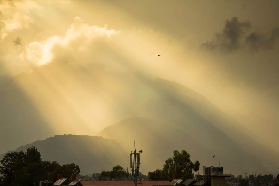National Geographic Travelさんのインスタグラム写真 - (National Geographic TravelInstagram)「Photo by @emilypolar | Rays of light break through late afternoon monsoon clouds covering the western edge of Kathmandu valley. With each year the monsoon rains seem to be coming earlier with more powerful storms. To see more of Nepal and beyond follow me @emilypolar #Nepal #Kathmandu #Monsoon」6月6日 19時05分 - natgeotravel