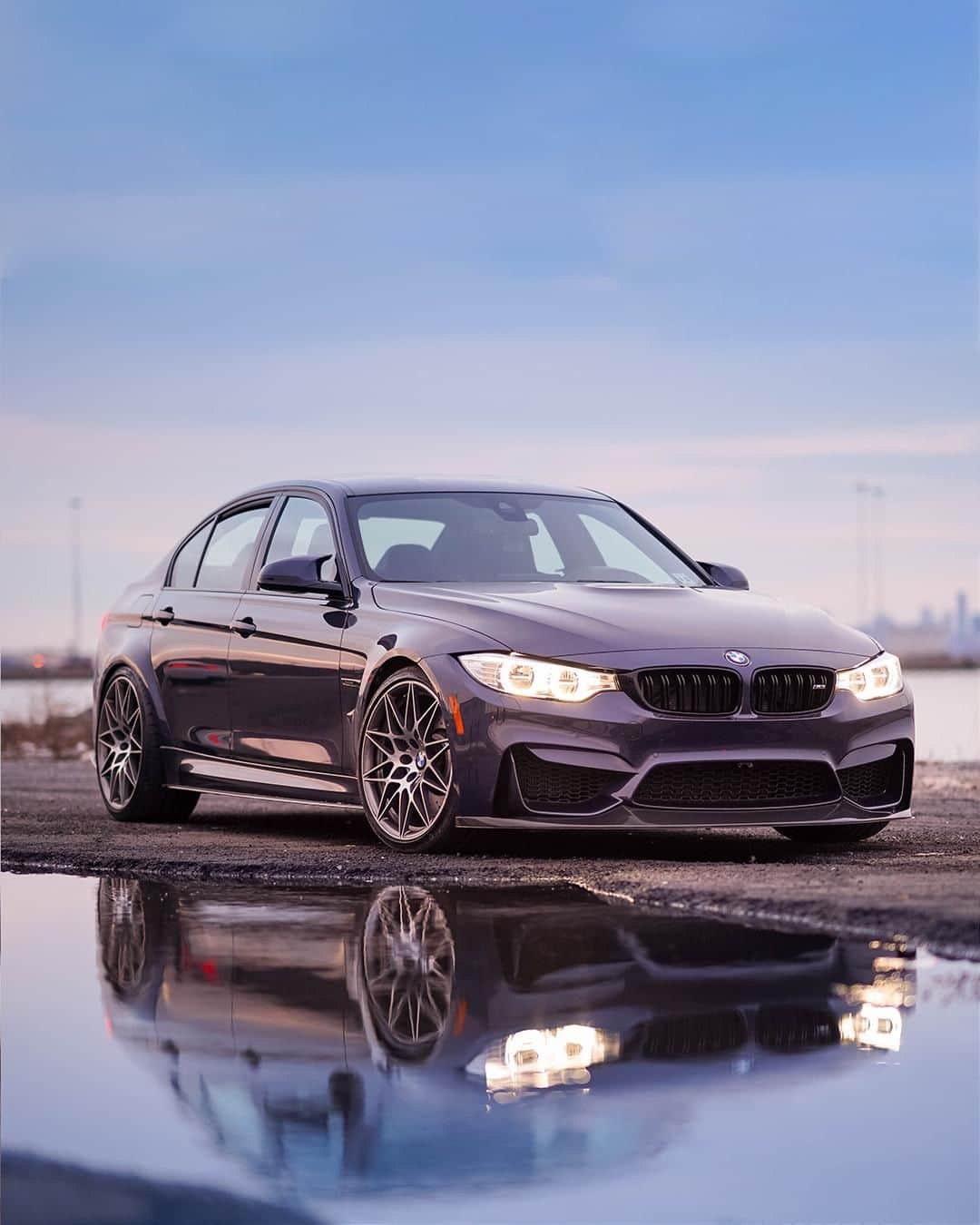 BMWのインスタグラム：「Groundbreaking look. The BMW M3 Sedan. #BMWrepost @ill_m4tic @Gr4y_brd #BMW #M3 #BMWM __ BMW M3 Sedan: Fuel consumption in l/100 km (combined): 8.8 (8.3). CO2 emissions in g/km (combined): 204 (194). The figures in brackets refer to the vehicle with seven-speed M double-clutch transmission with Drivelogic. The values of fuel consumptions, CO2 emissions and energy consumptions shown were determined according to the European Regulation (EC) 715/2007 in the version applicable at the time of type approval. The figures refer to a vehicle with basic configuration in Germany and the range shown considers optional equipment and the different size of wheels and tires available on the selected model. The values of the vehicles are already based on the new WLTP regulation and are translated back into NEDC-equivalent values in order to ensure the comparison between the vehicles. [With respect to these vehicles, for vehicle related taxes or other duties based (at least inter alia) on CO2-emissions the CO2 values may differ to the values stated here.] The CO2 efficiency specifications are determined according to Directive 1999/94/EC and the European Regulation in its current version applicable. The values shown are based on the fuel consumption, CO2 values and energy consumptions according to the NEDC cycle for the classification. For further information about the official fuel consumption and the specific CO2 emission of new passenger cars can be taken out of the „handbook of fuel consumption, the CO2 emission and power consumption of new passenger cars“, which is available at all selling points and at https://www.dat.de/angebote/verlagsprodukte/leitfaden-kraftstoffverbrauch.html.」