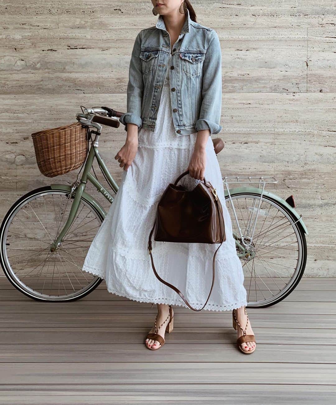 Shokoのインスタグラム：「＊Lifestyle＊ It’s been a very busy and stressful week as I’ve had a few nights of no sleep due to baby’s fever 🥵 but finally feeling relieved! Twining blue denim outfit with the baby. ・ Also happy to be able to fit in these sandals again as during my pregnancy I wasn’t able to fit any of my sandals due to water retention. ・ #outfit | jacket #levis | dress #boughtoffthestreet | sandals #gianvitorossi | bag #chanel #elleme | #babyoutfit #zarakids #ママコーデ」