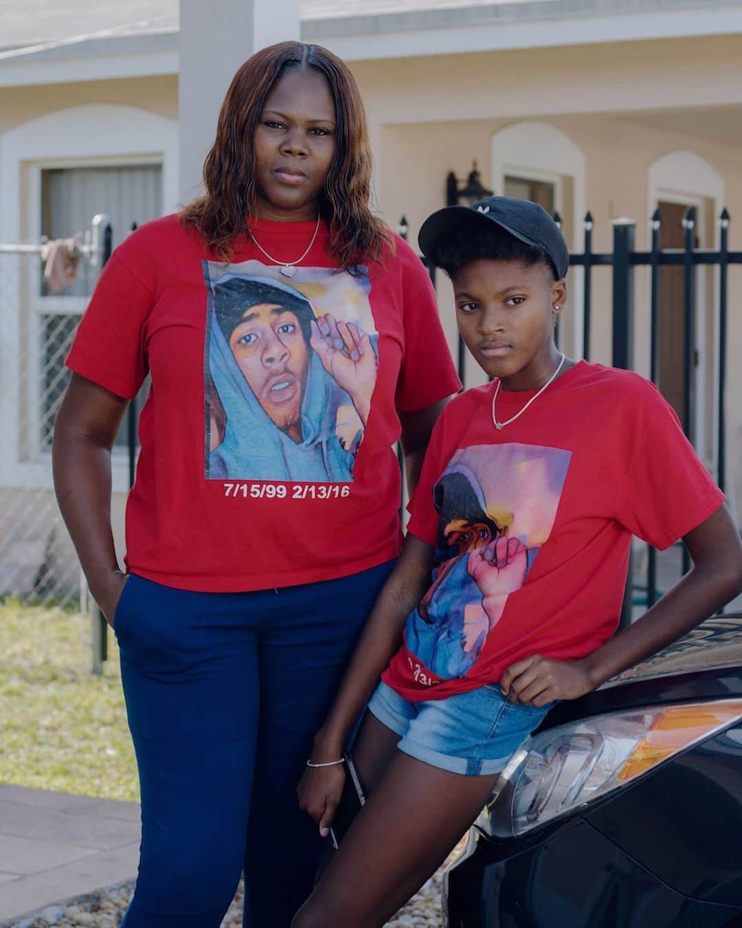 Vogue Italiaさんのインスタグラム写真 - (Vogue ItaliaInstagram)「‘Sunrise/Sunset’ is a portrait-based project by @ capturing the style phenomenon of “Rest in Peace” t-shirts. ‘In 2014, while photographing the funeral of Eric Garner - the Staten Island man killed by a New York City police officer - for The New York Times, I noticed an abundance of "Rest in Peace" shirts and I began to think about the way in which we mourn; in particular, I began to think about how communities that suffer disproportionally from gun violence mourn tragic events that have become altogether routine. To me, the "Rest in Peace" t-shirt trend is not only a symbol of the ubiquity of the gun violence that disproportionally plagues African American communities, but also an act of protest against the ways in which African American lives are often misrepresented and, sometimes, entirely forgotten after these acts of gun violence. Therefore, two years later after Eric Garner's funeral, I found myself at Platinum Graphics in New Orleans, speaking with owners Bryan and Trenice McMillian and photographing customers who'd purchased shirts for friends and family members lost to guns. The McMillian's welcomed me into their shop, educated me on the history of the "Rest in Peace" shirt tradition, and introduced me to New Orleans and the customers they serve. They also told me that, in the time that they had been in business, they had put former customers on shirts as well as family members.’ Tap the link in bio to read the Q&A with #BryanThomas by @ricacerbarano on vogue.it A selection from Sunrise/Sunset will be exhibited on the @Aperturefnd Summer Open 2019 Delirious Cities at Aperture Gallery in New York from July 25 to August 29, 2019.」6月22日 5時11分 - vogueitalia