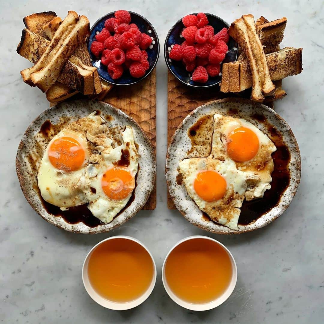 Symmetry Breakfastさんのインスタグラム写真 - (Symmetry BreakfastInstagram)「Saturday: Homemade KAYA toast! The full Kaya recipe is below and step by step in today’s Stories (plus Highlights later on) Served in the traditional way, kaya toast, with salty soy eggs and white peppaaa😍 Are you having buttered Kaya toast today? Is it your favourite? Or do you think “meh what is everyone on about?! ⭐️⭐️⭐️ - - - - - - - - - - - - - - - - - - - - - - - ***Recipe*** KAYA JAM 6 egg yolks 400ml (13.5floz) coconut milk 100g sugar, I used piloncillo from Mexico but use what you have to hand Flavourings: Pandan is the most common, however I couldn’t find any in Shanghai. 3 leaves tied into knots and infused with the milk is the norm, but try other flavours like cinnamon or any other spices you like! - - - - - - - - - - - - - - - - - - - - - - - 1 - Combine the coconut milk, sugar and flavourings of your choice in a saucepan over a medium heat. Cook until the sugar has dissolved. 2 - Remove the pan from the heat and leave to cool for 5 minutes. The remove the pandan leaves if using and strain the milk through a fine sieve to remove any undissolved sugar.  3 - In a small bowl, whisk the egg yolks until smooth and add a ladle of the cooled but still warm coconut milk and combine thoroughly. 4 - Place a bowl over a pan half filled with water. Make sure the water doesn’t touch the bottom of the bowl. 5 - Add the coconut milk and the egg mix to the bowl and turn the heat on medium low. Bring the water to a gentle simmer but do not allow it to boil and adjust the temperature if necessary 6 - Using a spatula, continuously stir the kaya for 15 minutes, it will start to thicken 7 - At 15 minutes you should have a thick custard consistency. Depending on your preference, continue for a further 5 minutes 8 - Carefully remove the bowl from the heat. Allow it to cool for 2-3 minutes 9 - In a freshly sterilised jar, pour the kaya in as carefully as possible. Allow to cool for a further 10 minutes before sealing and a further hour before refrigerating. 10 - Refrigerate for 10-12 hours #symmetrybreakfast」6月8日 13時55分 - symmetrybreakfast