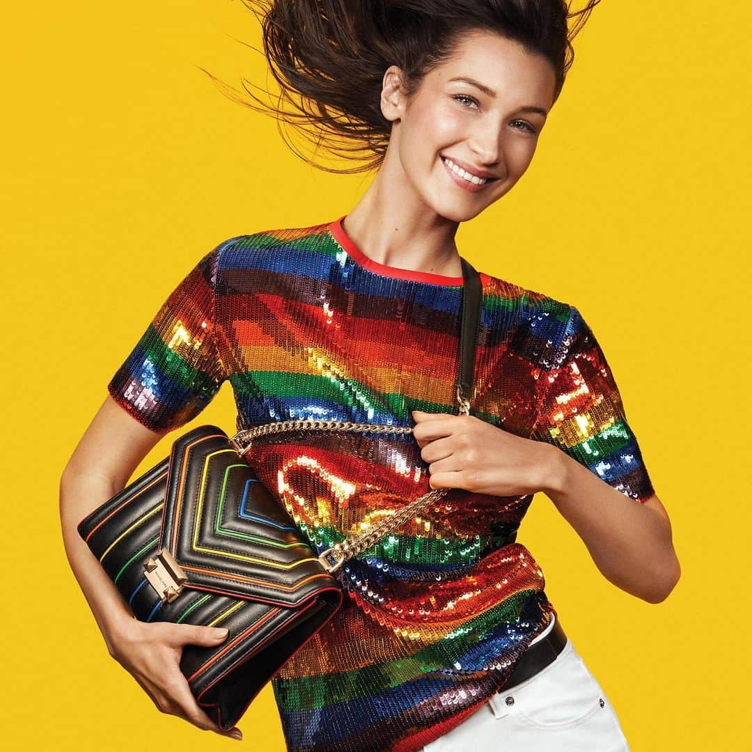 マイケルコースさんのインスタグラム写真 - (マイケルコースInstagram)「Make it pop! @BellaHadid sports #MKGO Rainbow. #MichaelKors  Our #MKGO Rainbow capsule is inspired by Pride. For every #Pride T-shirt sold in the U.S., Michael Kors will donate 100% of profits to @GodsLoveNYC, a longstanding pillar of the LGBTQ+ community.」6月8日 22時31分 - michaelkors