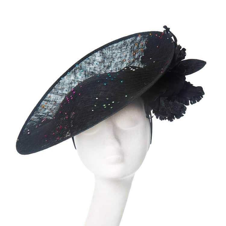 のインスタグラム：「#thoroughlymodernmillinery #🌈 Black sinamay super-saucer with a drape of @swarovski crystal veiling in jewel tones and black Cattleya orchids | An enchanting style from the “Midnight Cowboy” collection | #piersatkinson #hattersgonnahat #london #jewels #帽子 #chapeau #hat #✨ #glitz #💎」
