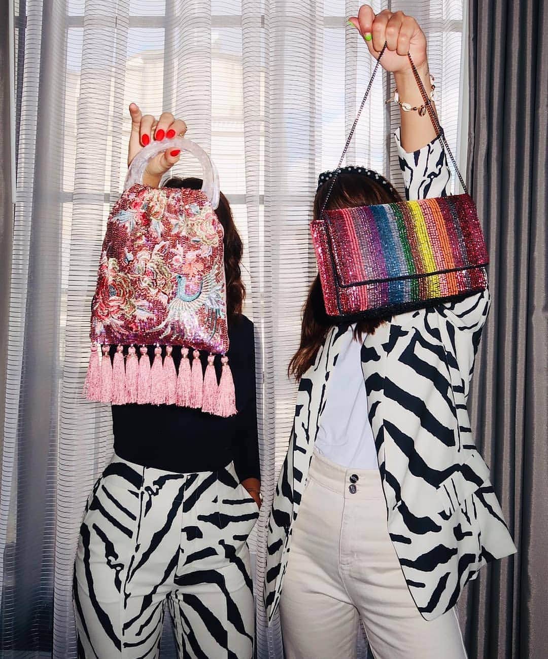 のインスタグラム：「It's #NationalBestFriendsDay and we're celebrating with this iconic duo; @meganellaby and @little_magpie1. 🎉  According to Megan, their friendship is "fun, colourful and adventurous" and Amy says it is "lots of larrrfs!" With a shared passion for exploring personal style and an obsession with accessories, there's no two better to show off our new-season must-haves. ×× Oriental embellished pouch 🔍: 7905820100 Rainbow beaded clutch 🔍: 7906579900 Megan's pearl hairband 🔍: 7867250300 #Accessorize #Accessorizer」
