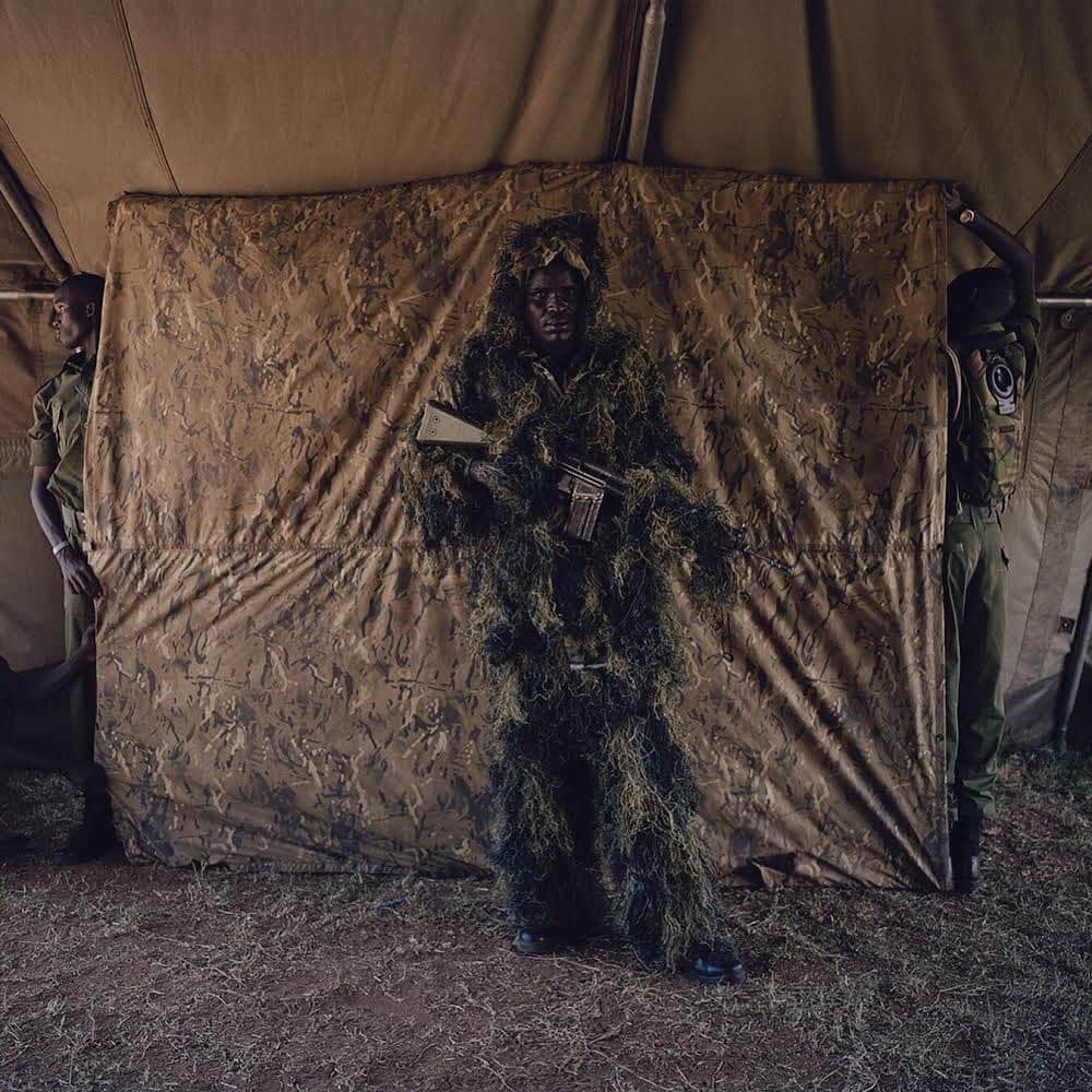 thephotosocietyさんのインスタグラム写真 - (thephotosocietyInstagram)「Photograph by David Chancellor @chancellordavid - set up a studio in the mess tent (swipe left) with help from some friends 🙏🏻 - ranger portraits, northern Kenya - in awe of the work these men and women do 👍🏿👍🏼🙏🏻 #conservation #withbutterfliesandwarriors #northernkenya #kenya @forrangers @thephotosociety @natgeo @everydayextinction 👍🏿👍🏼🖤💚」6月10日 11時17分 - thephotosociety