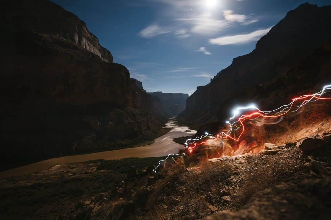 National Geographic Travelさんのインスタグラム写真 - (National Geographic TravelInstagram)「Photo by @max.lowe I Under full moons respite and exposure, we hiked up and away from the edge of the mighty Colorado River and into the hot night air. From the vantage of the trails above as we climbed towards the prehistoric Nankoweap Granaries, the river seemed less the raging force we had grown to know it as, and nothing more than a snaking silver ribbon cutting the darkness of the canyons rim above. Headlamp light trails in the dark on a trip down the Grand Canyon last fall. To see more from his trip down the Grand Canyon, follow @max.lowe」6月10日 15時57分 - natgeotravel