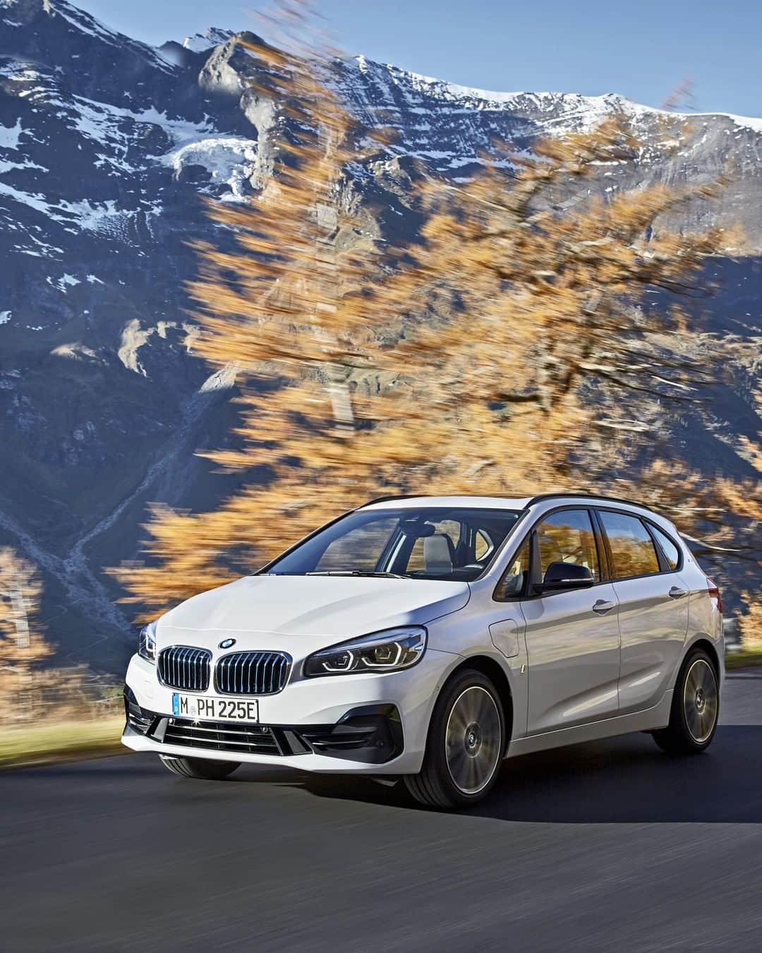 BMWのインスタグラム：「Electrifying partner to a big city life.  The BMW 2 Series Active Tourer. #BMW #2Series #familytime #activelife #mountains #wanderlust #electrified __ BMW 225xe Active Tourer: Energy consumption in kWh/100 km (combined): 13.7 - 13.4. Fuel consumption in l/100 km (combined): 2.5 - 2.3. CO2 emissions in g/km (combined): 57 - 52. The values of fuel consumptions, CO2 emissions and energy consumptions shown were determined according to the European Regulation (EC) 715/2007 in the version applicable at the time of type approval. The figures refer to a vehicle with basic configuration in Germany and the range shown considers optional equipment and the different size of wheels and tires available on the selected model. The values of the vehicles are already based on the new WLTP regulation and are translated back into NEDC-equivalent values in order to ensure the comparison between the vehicles. [With respect to these vehicles, for vehicle related taxes or other duties based (at least inter alia) on CO2-emissions the CO2 values may differ to the values stated here.] The CO2 efficiency specifications are determined according to Directive 1999/94/EC and the European Regulation in its current version applicable. The values shown are based on the fuel consumption, CO2 values and energy consumptions according to the NEDC cycle for the classification. For further information about the official fuel consumption and the specific CO2 emission of new passenger cars can be taken out of the „handbook of fuel consumption, the CO2 emission and power consumption of new passenger cars“, which is available at all selling points and at https://www.dat.de/angebote/verlagsprodukte/leitfaden-kraftstoffverbrauch.html.」