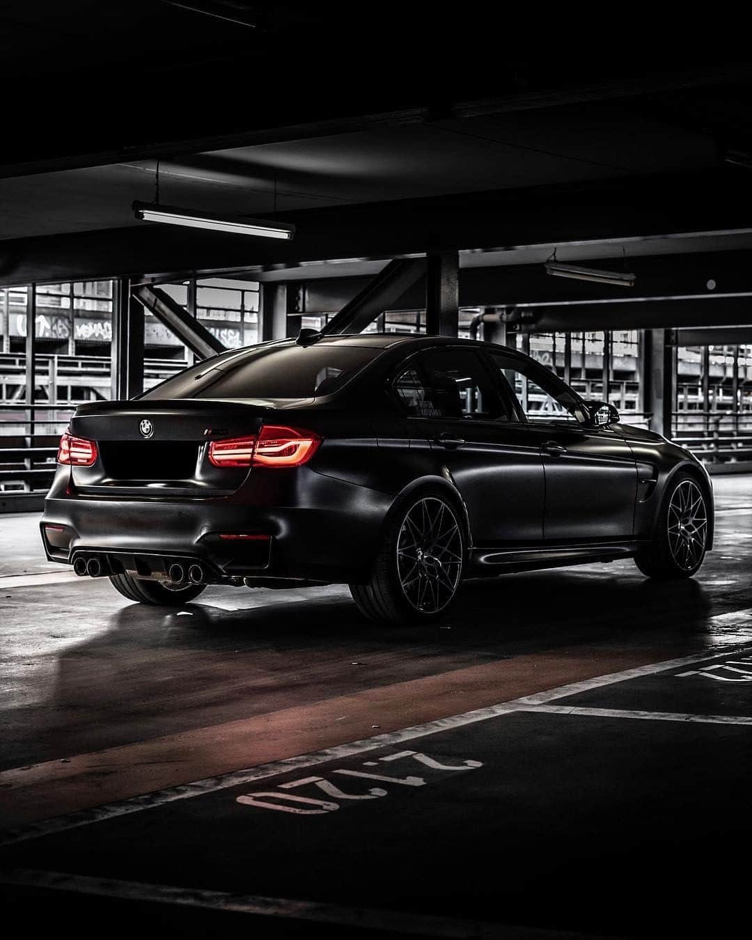BMWのインスタグラム：「Black version of sporty power. The BMW M3 Sedan. #BMWrepost @dschmdt #BMW #M3 #BMWM #Mpower #DrivingPerformance #performance #icon  __ BMW M3 Sedan: Fuel consumption in l/100 km (combined): 8.8 (8.3). CO2 emissions in g/km (combined): 204 (194). The figures in brackets refer to the vehicle with seven-speed M double-clutch transmission with Drivelogic. The values of fuel consumptions, CO2 emissions and energy consumptions shown were determined according to the European Regulation (EC) 715/2007 in the version applicable at the time of type approval. The figures refer to a vehicle with basic configuration in Germany and the range shown considers optional equipment and the different size of wheels and tires available on the selected model. The values of the vehicles are already based on the new WLTP regulation and are translated back into NEDC-equivalent values in order to ensure the comparison between the vehicles. [With respect to these vehicles, for vehicle related taxes or other duties based (at least inter alia) on CO2-emissions the CO2 values may differ to the values stated here.] The CO2 efficiency specifications are determined according to Directive 1999/94/EC and the European Regulation in its current version applicable. The values shown are based on the fuel consumption, CO2 values and energy consumptions according to the NEDC cycle for the classification. For further information about the official fuel consumption and the specific CO2 emission of new passenger cars can be taken out of the „handbook of fuel consumption, the CO2 emission and power consumption of new passenger cars“, which is available at all selling points and at https://www.dat.de/angebote/verlagsprodukte/leitfaden-kraftstoffverbrauch.html.」