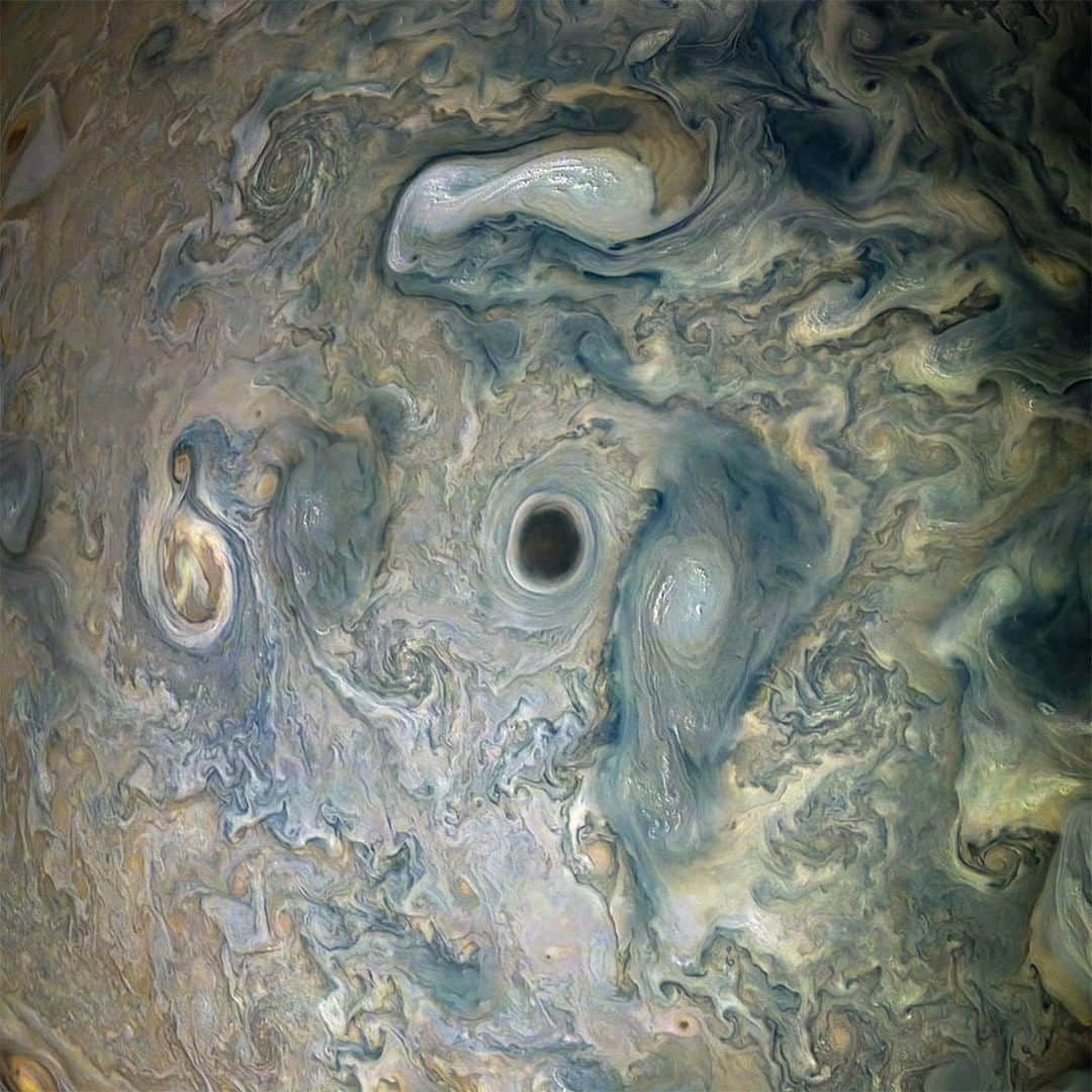 NASAさんのインスタグラム写真 - (NASAInstagram)「At first glance, these swirling clouds might look like cream in coffee. ☕ ⁣ ⁣ In fact, during a flyby of Jupiter, our @NASAJuno spacecraft captured this view of an area within a Jovian jet stream showing a vortex that has an intensely dark center. ⁣ ⁣ At the time, Juno  was about 9,200 miles from the planet's cloud tops. Nearby, other features display bright, high altitude clouds that have puffed up into the sunlight.⁣ ⁣ Enhanced Image by Gerald Eichstadt and Sean Doran (CC BY-NC-SA) based on images provided Courtesy of NASA/JPL-Caltech/SwRI/MSSS ⁣ ⁣ #NASA #Jupiter #SolarSystem #Storms #CoffeeInTheMorning」6月12日 4時52分 - nasa