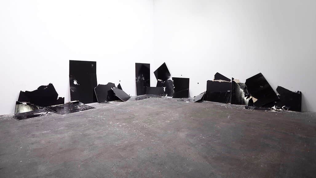ガゴシアン・ギャラリーさんのインスタグラム写真 - (ガゴシアン・ギャラリーInstagram)「#ArtBaselUnlimited: Steven Parrino's "13 Shattered Panels (for Joey Ramone)" (2001) is featured at Art Basel Unlimited 2019!  Parrino's "13 Shattered Panels (for Joey Ramone)" is a spontaneous and emotive abstract composition born out of destructive action. The work functions as a sort of shrine to the punk legend whose rock band, The Ramones, forever changed the American music scene of the late 1970s. Segments of plasterboard are painted shiny black and broken into pieces, evoking The Ramones’s reductive guitar rhythms and ensembles of black leather and torn jeans.  To receive a PDF with detailed information on the works, please contact the gallery at inquire@gagosian.com or direct message us. __________ #StevenParrino #ArtBasel #Gagosian @artbasel Steven Parrino, "13 Shattered Panels (for Joey Ramone)," 2001. Artwork © Steven Parrino. Photos: Sebastiano Pellion」6月12日 5時12分 - gagosian