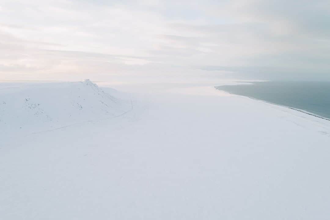 National Geographic Travelさんのインスタグラム写真 - (National Geographic TravelInstagram)「Photo by @kiliiiyuyan | A vast expanse of white snow covers Saint Lawrence Island in the Bering Sea between Alaska and Russia. Although seemingly devoid of life, this island is at a crossroad of currents, bringing walruses, whales, and halibut to its shores and its indigenous Siberian Yup’ik community. Follow me, @kiliiiyuyan, for more from the Arctic and beyond. #arctic #Alaska #BeringSea」6月12日 7時01分 - natgeotravel
