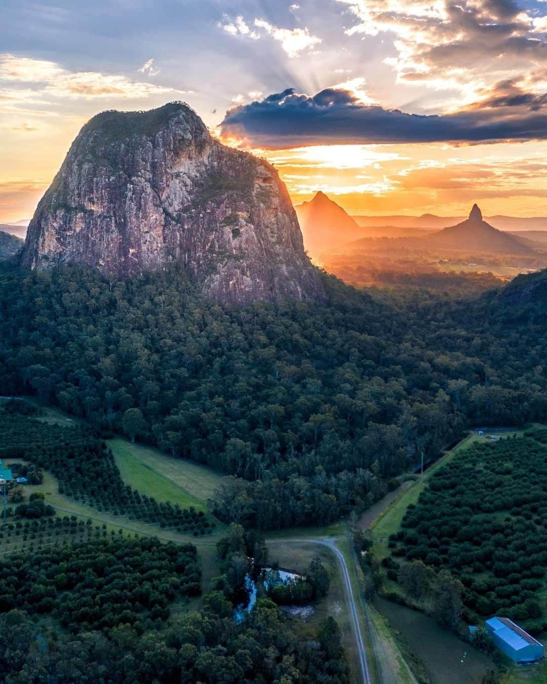 Australiaさんのインスタグラム写真 - (AustraliaInstagram)「What a view to end the day 🌄 @britinbrisbane enjoyed this spectacular #sunset view at @queensland’s #GlasshouseMountains National Park, as the golden light poured over the 11 mountain peaks. This @visitsunshinecoast national park is only an hour from @visitnoosa and @visitbrisbane, which makes it an excellent day trip for nature lovers and keen hikers. We recommend staying a few nights in the area to explore more of @sunshinecoasthinterland though; base yourself at @glassonglasshouse or @spicerstamarindretreat, so you can treat yourself to a spa bath and hot coffee after a long day of hiking in the mountains.  #seeaustralia #thisisqueensland #visitsunshinecoast #sunshinecoasthinterland #travel #thegreatoutdoors」6月12日 20時00分 - australia
