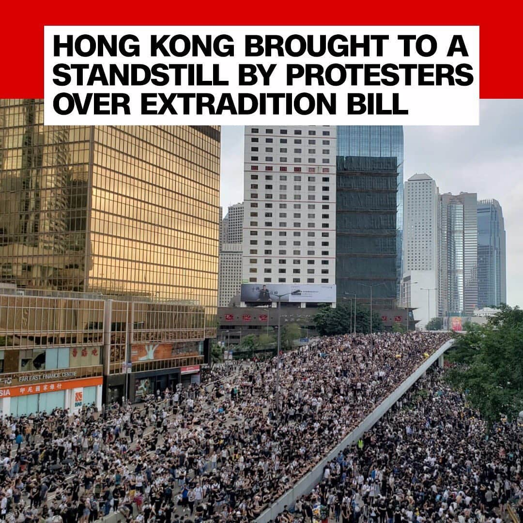 CNNさんのインスタグラム写真 - (CNNInstagram)「Tens of thousands of demonstrators are blocking roads in Hong Kong, protesting against a controversial bill that would allow China to extradite fugitives from the city. Protesters began arriving outside the Legislative Council buildings on Tuesday night, where they were greeted by a heavy police presence and bag searches. By Wednesday morning, tens of thousands of mainly young people had arrived in the area, bringing central Hong Kong to a standstill. Police fired a water canon on a protester and used pepper spray on others, while some protesters were seen wearing helmets and goggles, and pulling bricks from the sidewalks. Although Hong Kong is part of China, it was a British colony until 1997, and has separate laws and no capital punishment, unlike mainland China. Many people fear that the proposed extradition law means they could be taken from Hong Kong by Chinese authorities for political reasons. Hundreds of businesses, parents and teachers have called for a boycott of work and school on Wednesday to show their opposition to the bill. The debate that lawmakers were due to have over the bill on Wednesday has been postponed to a later date. 📸: Ben Westcott/CNN & Anthony Wallace/Getty Images」6月12日 15時56分 - cnn