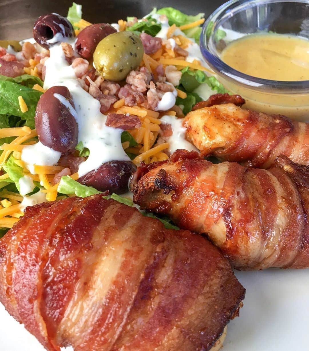 Flavorgod Seasoningsさんのインスタグラム写真 - (Flavorgod SeasoningsInstagram)「KETO Bacon Wrapped Chicken Thighs ⠀ -⠀ KETO friendly flavors available here ⬇️⠀ Click the link in the bio -> @flavorgod⠀ www.flavorgod.com⠀ -⠀ By @ketogalsara⠀ -⠀ 💥Soooo much yes!!! I experimented tonight and made bacon wrapped chicken thighs and they were BOMB 💣⠀ -⠀ 🏷Tag a friend who needs to make this 🤩⠀ -⠀ 🔹First I trimmed the fat off the chicken thighs⠀ 🔹Then cut them in half⠀ 🔹Next I seasoned them with bacon lovers seasoning from @flavorgod .⠀ 🔹Then I wrapped them in @pedersonsfarms bacon⠀ 🔹Placed them on my air fryer skewer rack⠀ 🔹Air fried at 360° for 14 minutes flipping halfway. 🔹Served them up with @ghughessugarfree Honey Mustard and enjoyed this delicious meal.⠀ -⠀ Flavor God Seasonings are:⠀ 💥ZERO CALORIES PER SERVING⠀ 🌿 Made Fresh⠀ 🔥 KETO & PALEO⠀ 🌱 GLUTEN FREE & KOSHER⠀ ☀️ VEGAN FRIENDLY ⠀ 🌊 Low salt⠀ ⏰Shelf life is 24 months⠀ -⠀ -⠀ #food #foodie #flavorgod #seasonings #glutenfree #mealprep  #keto #paleo #vegan #kosher #breakfast #lunch #dinner #yummy #delicious #foodporn ⠀」6月13日 9時00分 - flavorgod