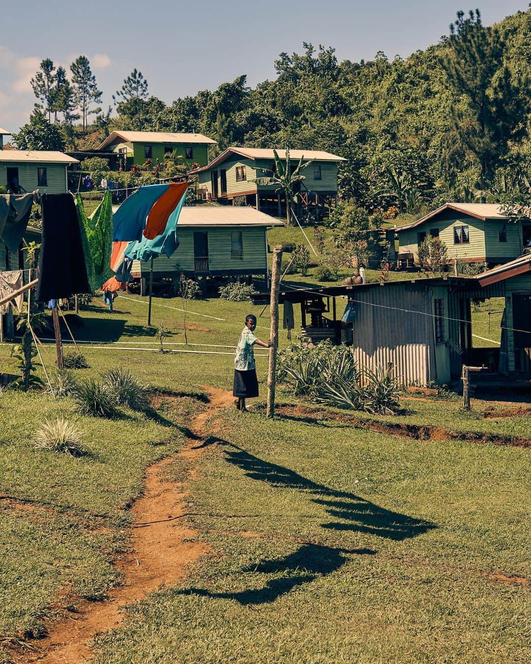 TIME Magazineさんのインスタグラム写真 - (TIME MagazineInstagram)「The long journey to the Fijian village of Vunidogoloa leads to a #ghosttown forced into retreat by #climatechange and the rising seas that come with it. Once home to more than 100 people, Vunidogoloa has been overrun by the tropical forest. Plants cover the town square. The stench of rotting rodents wafts from abandoned homes, and salt water seeps up through the soil as far as 300 ft. from Natewa Bay. A few times a year, king tides inundate the village with knee-high waters; locals were forced to place precious possessions on tall surfaces and run for the hills. And so, five years ago, Vunidogoloa was abandoned. The Fijian government built a new town about a mile up the hill at a cost of half a million dollars. Prime Minister Frank Bainimarama tells TIME he plans to move 40 Fijian villages in the coming years to cope with rising sea levels. “Every day," he says, "I think about climate change." Read this week's full cover story—Our Sinking #Planet—and see more pictures at the link in bio. Photographs by @cgregoryphoto for TIME」6月13日 23時45分 - time