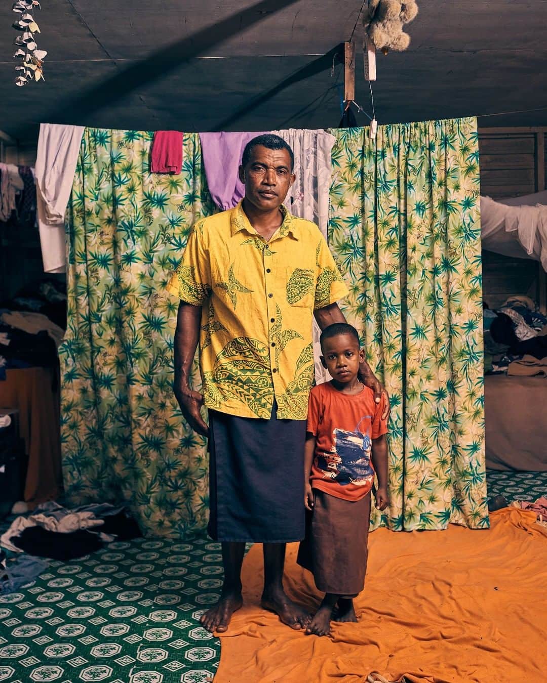 TIME Magazineさんのインスタグラム写真 - (TIME MagazineInstagram)「Penioni Soqovata and his son Josefa Mairara, photographed in their home in the town built to replace Vunidogoloa, the first place in Fiji to be relocated due to the effects of climate change, in May. The boy was the first baby born in the relocated village. In the aftermath of President Trump’s election victory, Fiji won a bid to lead the 2017 @unitednations climate talks—a massive task that entailed not only hosting key meetings that brought top officials to #Fiji to see the ravages of #climatechange firsthand but also guiding nearly 200 countries to policy consensus and, by extension, keeping the global climate regimen on track. With support from the U.S. and others, Fiji’s bid was successful. “We are very small emitters," says Fijian Prime Minister Frank Bainimarama, "but we cannot afford to be fighting from the rear." Simply bearing witness to the crisis in nations like this one has made a difference, writes Justin Worland. Read this week's full cover story—Our Sinking #Planet—and see more pictures at the link in bio. Photograph by @cgregoryphoto for TIME」6月14日 9時17分 - time