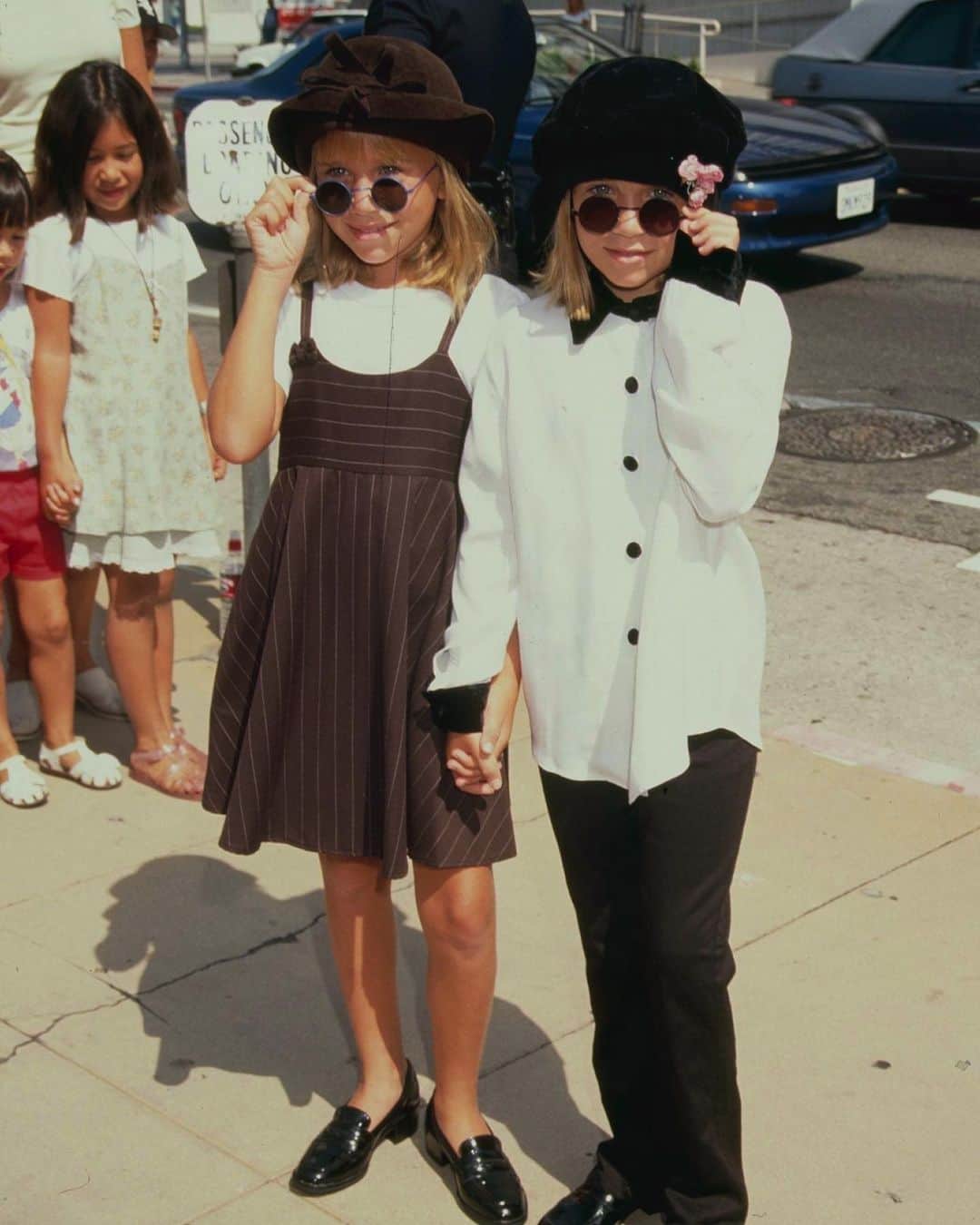 E! Onlineさんのインスタグラム写真 - (E! OnlineInstagram)「We just want to take a (New York) minute to look back at Mary-Kate and Ashley Olsen’s fashion evolution to celebrate their 33rd birthday. Follow our @stylecollective page for more fashion and comment “you got it dude 👍” when you do. (📷: Getty Images)」6月14日 3時49分 - enews