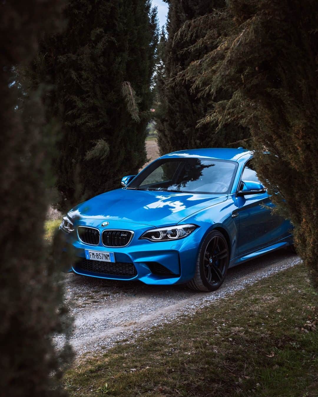 BMWのインスタグラム：「A true bright spot. The BMW M2 Coupé. #BMWrepost @mat__m2__pro @filippo_cesarini #BMW #M2 #BMWM #sportscar #horsepower #landscape #nature #power __ BMW M2 Coupé: Fuel consumption in l/100 km (combined): 8.5. CO2 emissions in g/km (combined): 199. The values of fuel consumptions, CO2 emissions and energy consumptions shown were determined according to the European Regulation (EC) 715/2007 in the version applicable at the time of type approval. The figures refer to a vehicle with basic configuration in Germany and the range shown considers optional equipment and the different size of wheels and tires available on the selected model. The values of the vehicles are already based on the new WLTP regulation and are translated back into NEDC-equivalent values in order to ensure the comparison between the vehicles. [With respect to these vehicles, for vehicle related taxes or other duties based (at least inter alia) on CO2-emissions the CO2 values may differ to the values stated here.] The CO2 efficiency specifications are determined according to Directive 1999/94/EC and the European Regulation in its current version applicable. The values shown are based on the fuel consumption, CO2 values and energy consumptions according to the NEDC cycle for the classification. For further information about the official fuel consumption and the specific CO2 emission of new passenger cars can be taken out of the „handbook of fuel consumption, the CO2 emission and power consumption of new passenger cars“, which is available at all selling points and at https://www.dat.de/angebote/verlagsprodukte/leitfaden-kraftstoffverbrauch.html.」