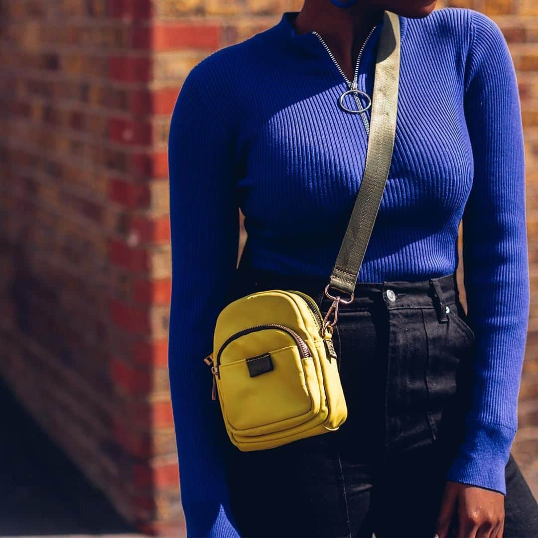アクセサライズのインスタグラム：「Take your festival fit to the next level with a splash of neon in a sporty nylon. With its adjustable strap you can wear the Maeve as a cross-body or shorten its strap for the belt bag look of the season. 📷 @remiafolabi  Tap the link in the bio to shop now.  #Accessorize #Accessorizer #festival」