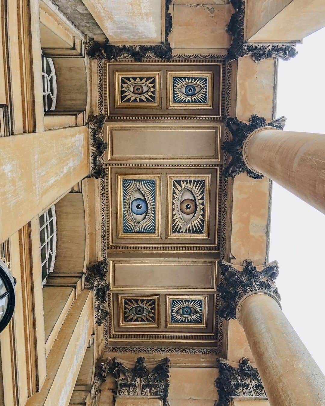 ペンハリガンさんのインスタグラム写真 - (ペンハリガンInstagram)「One of the most fascinating and oft overlooked delights within Blenheim Palace are the several eyes looking down at you as you approach the portico in the Great Court. These were commissioned by the 9th Duke's second wife, Gladys Deacon, and painted in 1928 by artist, Colin Gill. The Duke’s eyes were brown and hers blue and there are six of them staring down at you. Why six? Good question; no one can really be sure! #penhaligonsxblenheimpalace #blenheimpalace #littleknownblenheim」6月14日 21時00分 - penhaligons