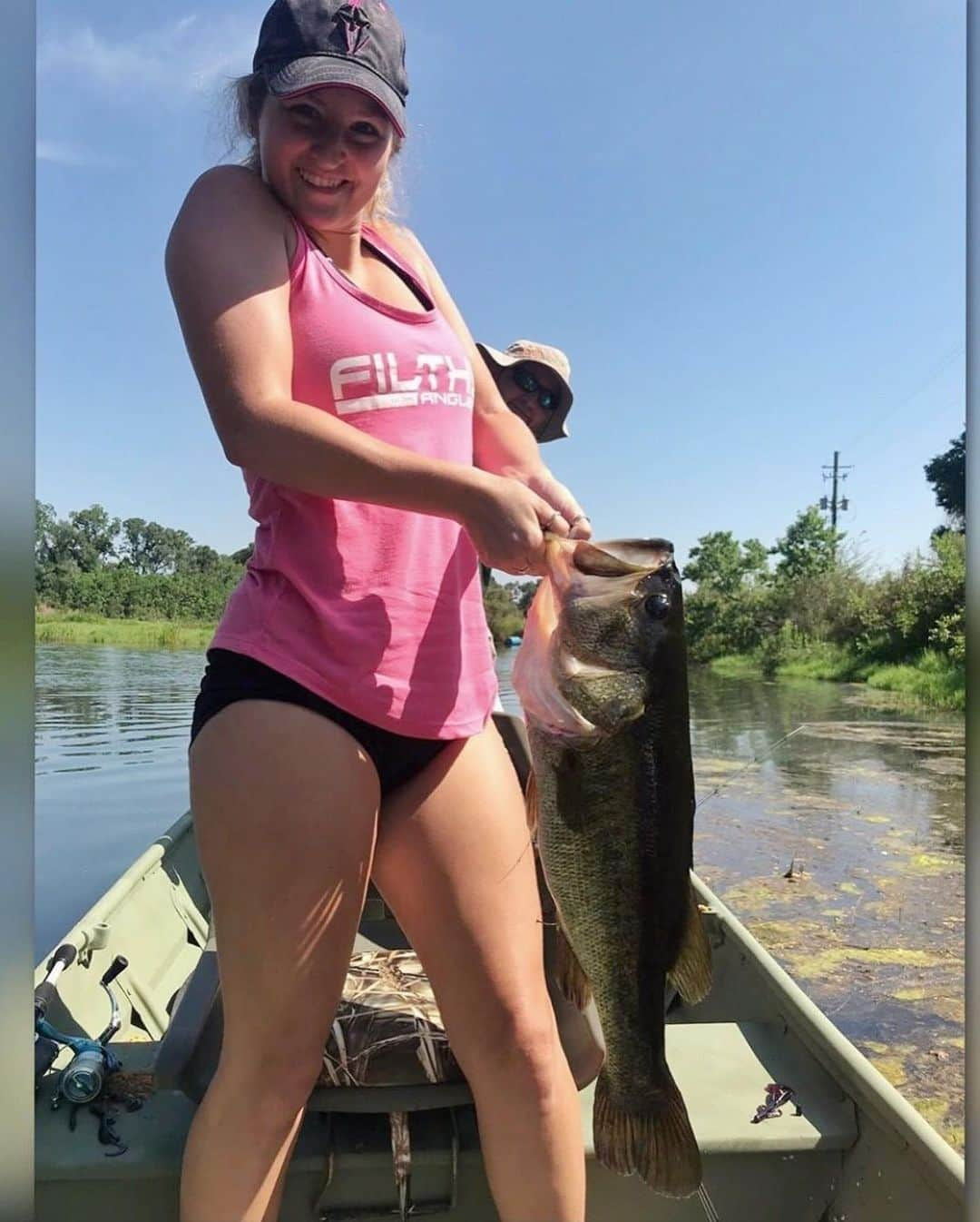 Filthy Anglers™さんのインスタグラム写真 - (Filthy Anglers™Instagram)「Happy Filthy Friday my friends! Today's Filthy Female is  team member @danniilovee - talk about coming in bringing some high heat! Check out this 8.4lbs largemouth bass she landed this past week, while wearing her pink Filthy Tank! Absolutely a fish of a lifetime for her. I'm also loving the random photo bombs in the background of both photos. Congrats on the beast @danniilovee you are Certified Filthy! www.filthyanglers.com  #fishing #catchandrelease #filthyanglers #filthyfemales #largemouthbass #getoutside #anglerapproved #outdoors #teamfilthy  #lakelife  #girlswhofish #girlsfishtoo #fishinggirls #reelgirlsfish #rippinlips #boat #bigbass #monsterbass #bmb」6月15日 10時11分 - filthyanglers