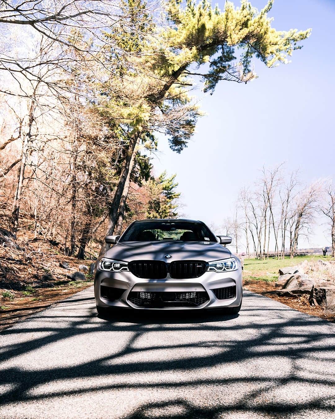 BMWのインスタグラム：「A powerful member of the top league. The BMW M5 Sedan. #BMWrepost @liv3life_m5 @aimonbmw #BMW #BMWM5 #BMWM #road #trip #sportscar #horsepower #Mpower #DrivingPerformance #performance  __ BMW M5 Sedan: Fuel consumption in l/100 km (combined): 10.8 - 10.7. CO2 emissions in g/km (combined): 246 - 243. The values of fuel consumptions, CO2 emissions and energy consumptions shown were determined according to the European Regulation (EC) 715/2007 in the version applicable at the time of type approval. The figures refer to a vehicle with basic configuration in Germany and the range shown considers optional equipment and the different size of wheels and tires available on the selected model. The values of the vehicles are already based on the new WLTP regulation and are translated back into NEDC-equivalent values in order to ensure the comparison between the vehicles. [With respect to these vehicles, for vehicle related taxes or other duties based (at least inter alia) on CO2-emissions the CO2 values may differ to the values stated here.] The CO2 efficiency specifications are determined according to Directive 1999/94/EC and the European Regulation in its current version applicable. The values shown are based on the fuel consumption, CO2 values and energy consumptions according to the NEDC cycle for the classification. For further information about the official fuel consumption and the specific CO2 emission of new passenger cars can be taken out of the „handbook of fuel consumption, the CO2 emission and power consumption of new passenger cars“, which is available at all selling points and at https://www.dat.de/angebote/verlagsprodukte/leitfaden-kraftstoffverbrauch.html.」