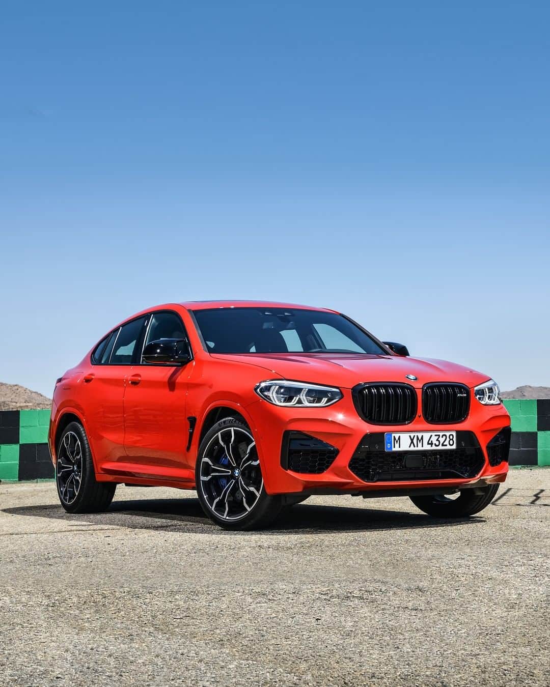 BMWのインスタグラム：「Escaping from challenges is not in its vocabulary. The first-ever BMW X4 M. #BMW #X4M #BMWM __ BMW X4 M: Fuel consumption in l/100 km (combined): 10.5. CO2 emissions in g/km (combined): 239. The values of fuel consumptions, CO2 emissions and energy consumptions shown were determined according to the European Regulation (EC) 715/2007 in the version applicable at the time of type approval. The figures refer to a vehicle with basic configuration in Germany and the range shown considers optional equipment and the different size of wheels and tires available on the selected model. The values of the vehicles are already based on the new WLTP regulation and are translated back into NEDC-equivalent values in order to ensure the comparison between the vehicles. [With respect to these vehicles, for vehicle related taxes or other duties based (at least inter alia) on CO2-emissions the CO2 values may differ to the values stated here.] The CO2 efficiency specifications are determined according to Directive 1999/94/EC and the European Regulation in its current version applicable. The values shown are based on the fuel consumption, CO2 values and energy consumptions according to the NEDC cycle for the classification. For further information about the official fuel consumption and the specific CO2 emission of new passenger cars can be taken out of the „handbook of fuel consumption, the CO2 emission and power consumption of new passenger cars“, which is available at all selling points and at https://www.dat.de/angebote/verlagsprodukte/leitfaden-kraftstoffverbrauch.html.」