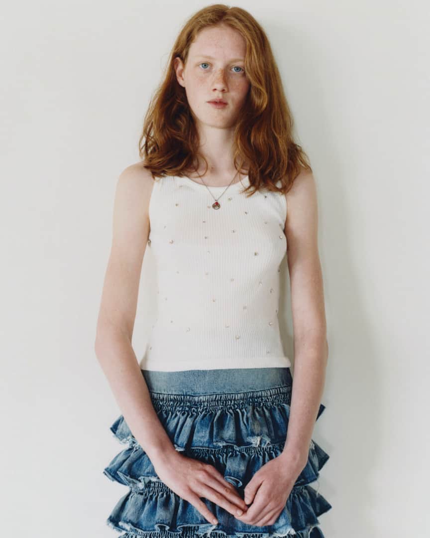 Miu Miuさんのインスタグラム写真 - (Miu MiuInstagram)「Miu Miu Portraits by @Julie_Greve & @LottaVolkova.  Girls photographed just as they are, but in #MiuMiu clothes.  Fiona wears an embellished white top and a ruffled denim skirt.」7月17日 0時30分 - miumiu