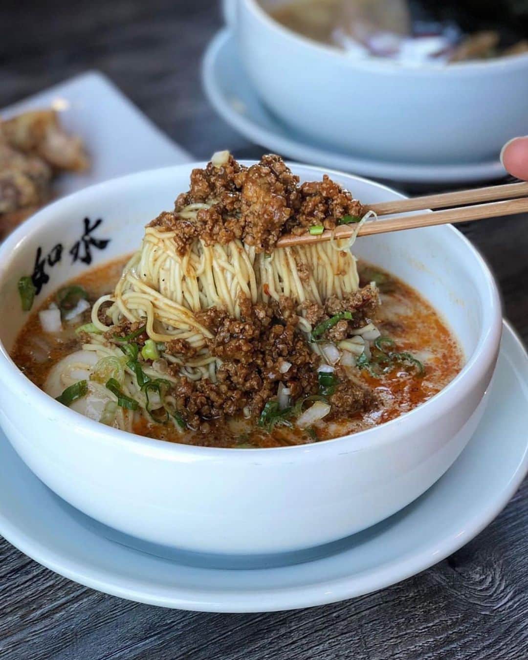 Eater LAさんのインスタグラム写真 - (Eater LAInstagram)「TanTan Ramen from @josuiramen. Sweet miso pork, spicy house layu, bean sprouts, and minced onions. 📸: @foodmento. Hashtag #eaterla on your best photos for a chance to be featured.」7月13日 9時11分 - eater_la