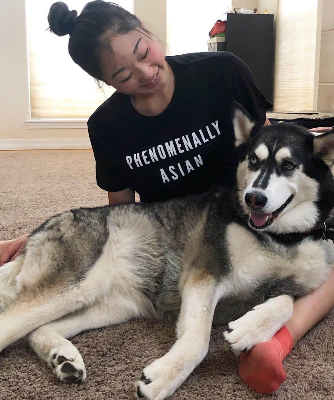 のインスタグラム：「No shoes in the house. • No makeup in the house. • Hair in a topknot. • Tons of good luck trinkets in the corner. • Have a sassy dog. • These are part of the things that make me #phenomenallyAsian but we are part of a vast diversity in the Asian community. The “model minority” myth suggests all of us are the same, but we are not monolithic. Today we come together to acknowledge the need for better representation, because we are #PhenomenallyAsian. T-shirt by @phenomenal.ly benefits @NAPAWF, which builds power with AAPI women & girls.」