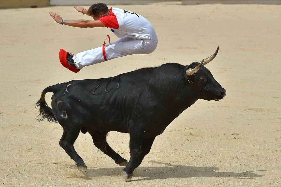 NBC Newsさんのインスタグラム写真 - (NBC NewsInstagram)「An acrobat jumps over a bull during a bull-leaping show at the San Fermin festival in #Pamplona, Spain, on Friday. . 📷 Ander Gillenea / @afpphoto / @gettyimages」7月14日 6時14分 - nbcnews